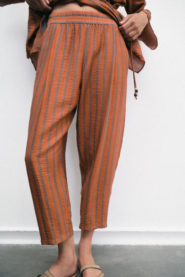 PANTALON À RAYURES ET TAILLE ÉLASTIQUE - Orange brûlé de Zara - Image 1