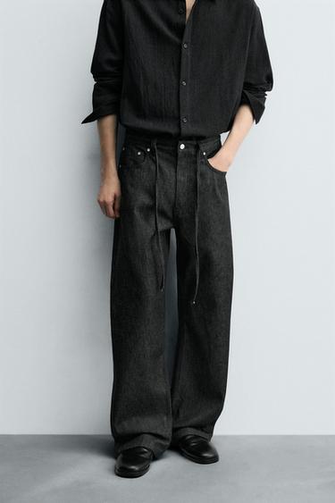 QUẦN JEANS DÁNG RELAXED FLARE FIT - Màu đen từ Zara