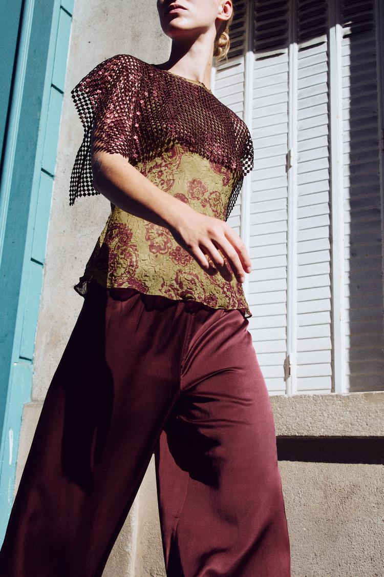 TOP ESTAMPADO CAPA LENTEJUELAS