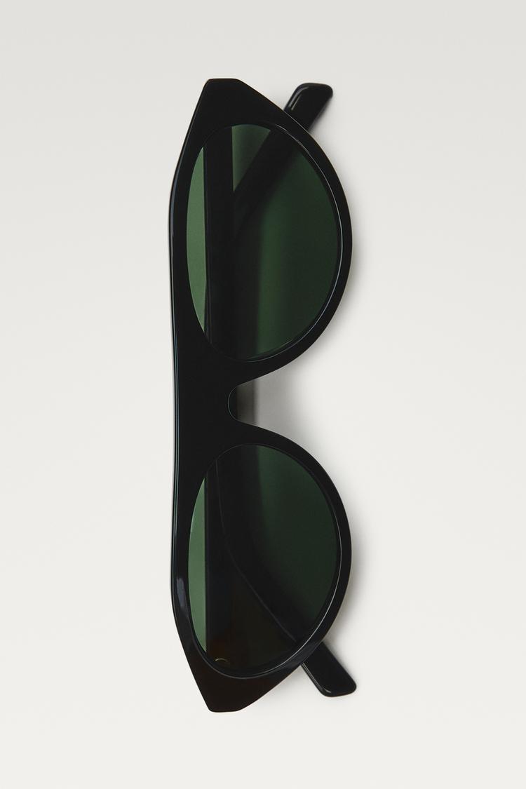 Oval sunglasses — Black