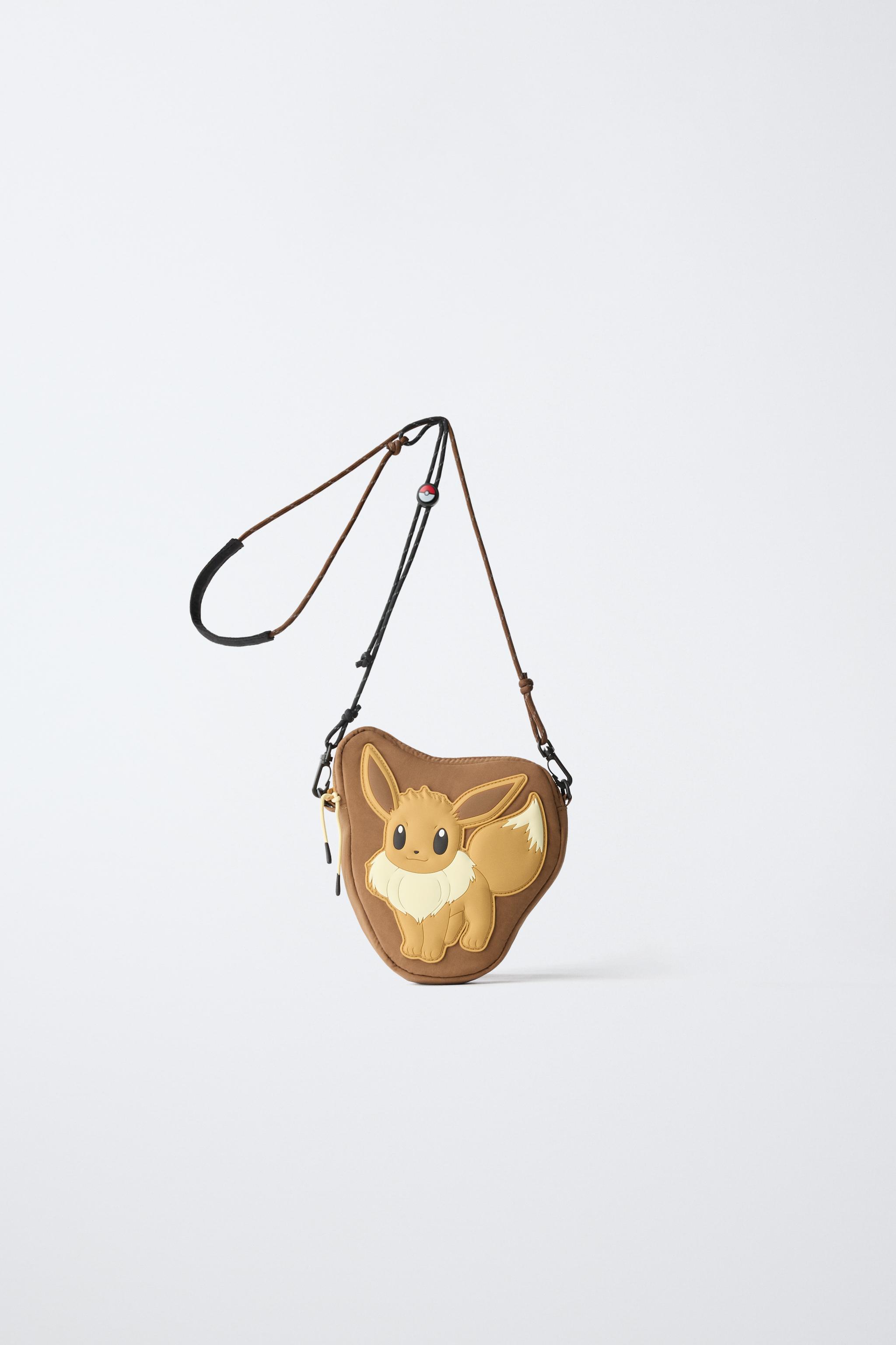 EEVEE™ POKÉMON CROSSBODY BAG — Brown