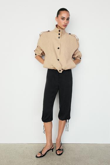 Pantalón capri bajo lazada mezcla seda - Negro de Zara