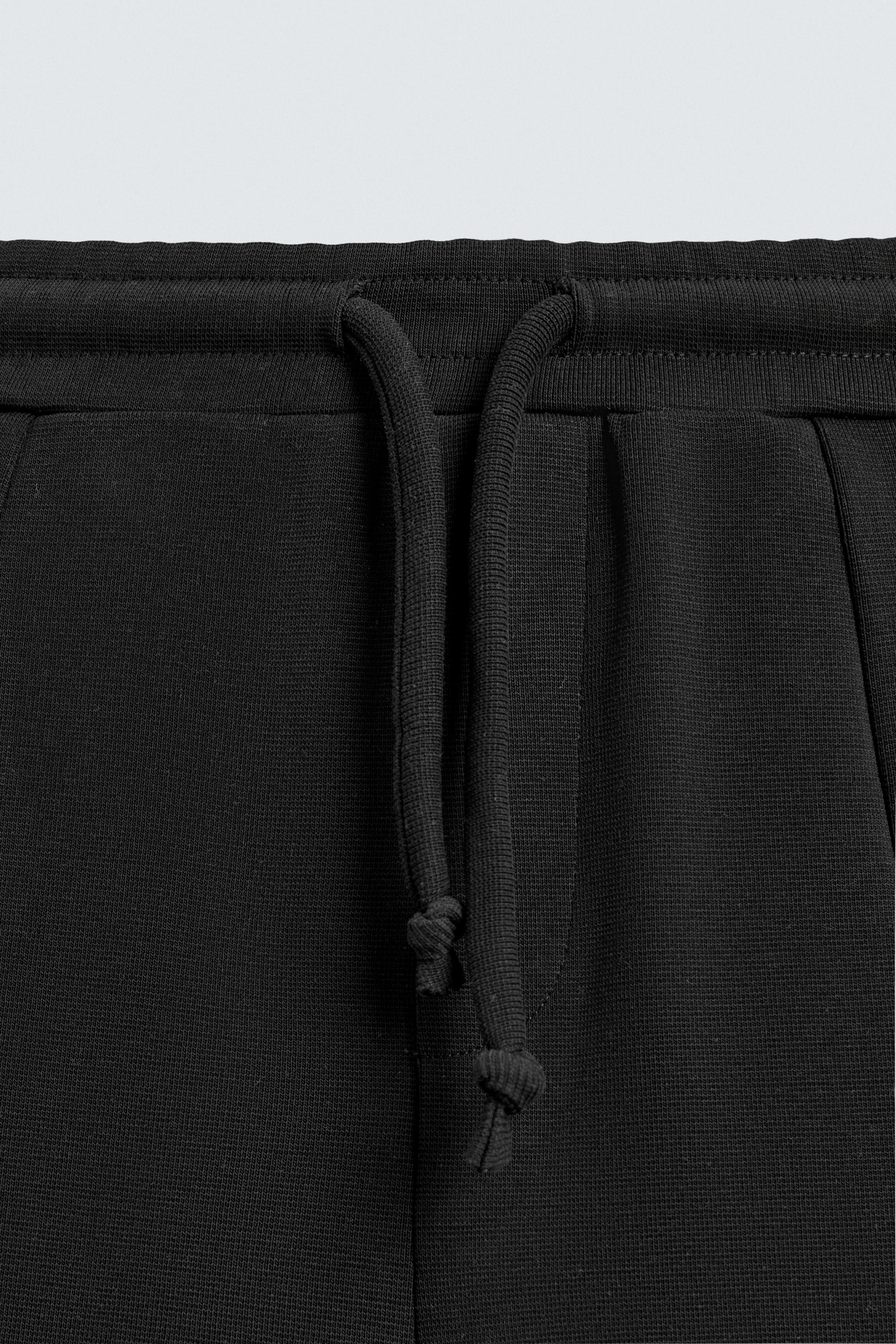 RELAXED FIT SEAMED JOGGING PANTS