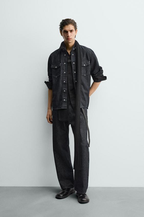 RELAXED FIT STUDDED JEANS