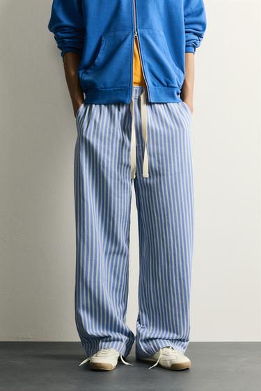 STRIPED BAGGY FIT TROUSERS - Stripes by Zara