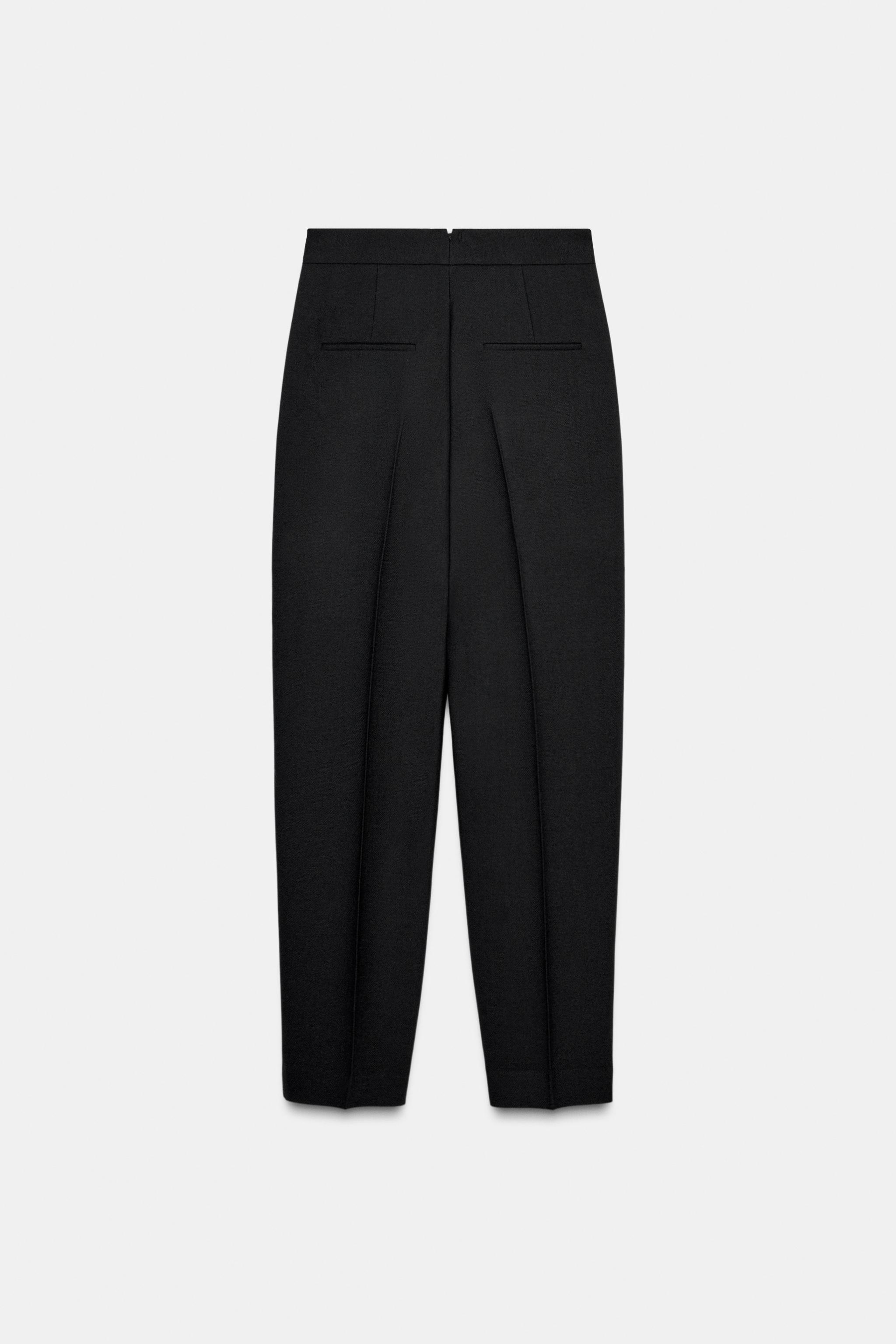 LIMITED EDITION WOOL PLEATED PANTS