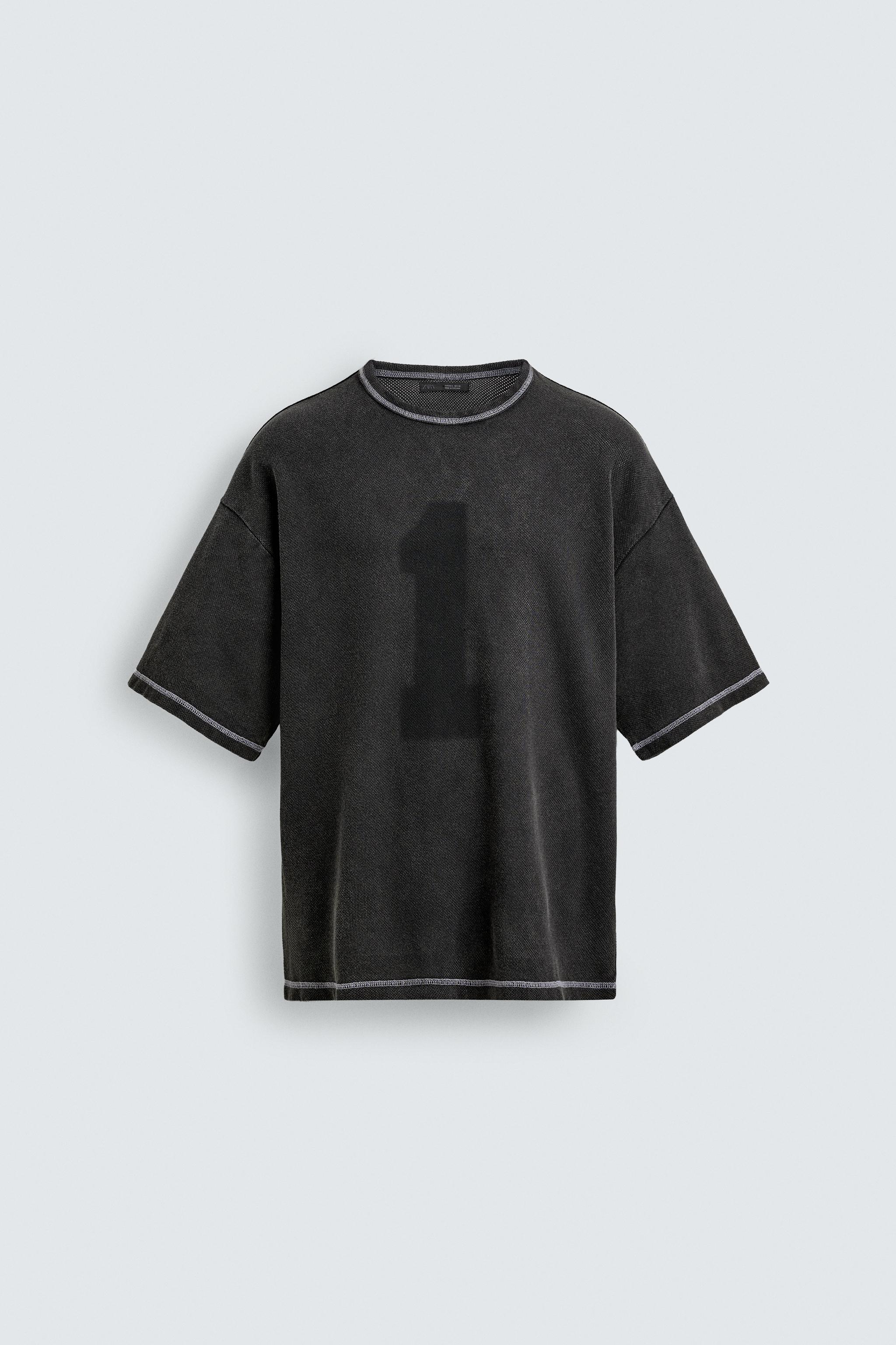 T-SHIRT EN MAILLE DÉLAVÉE CONTRASTÉE