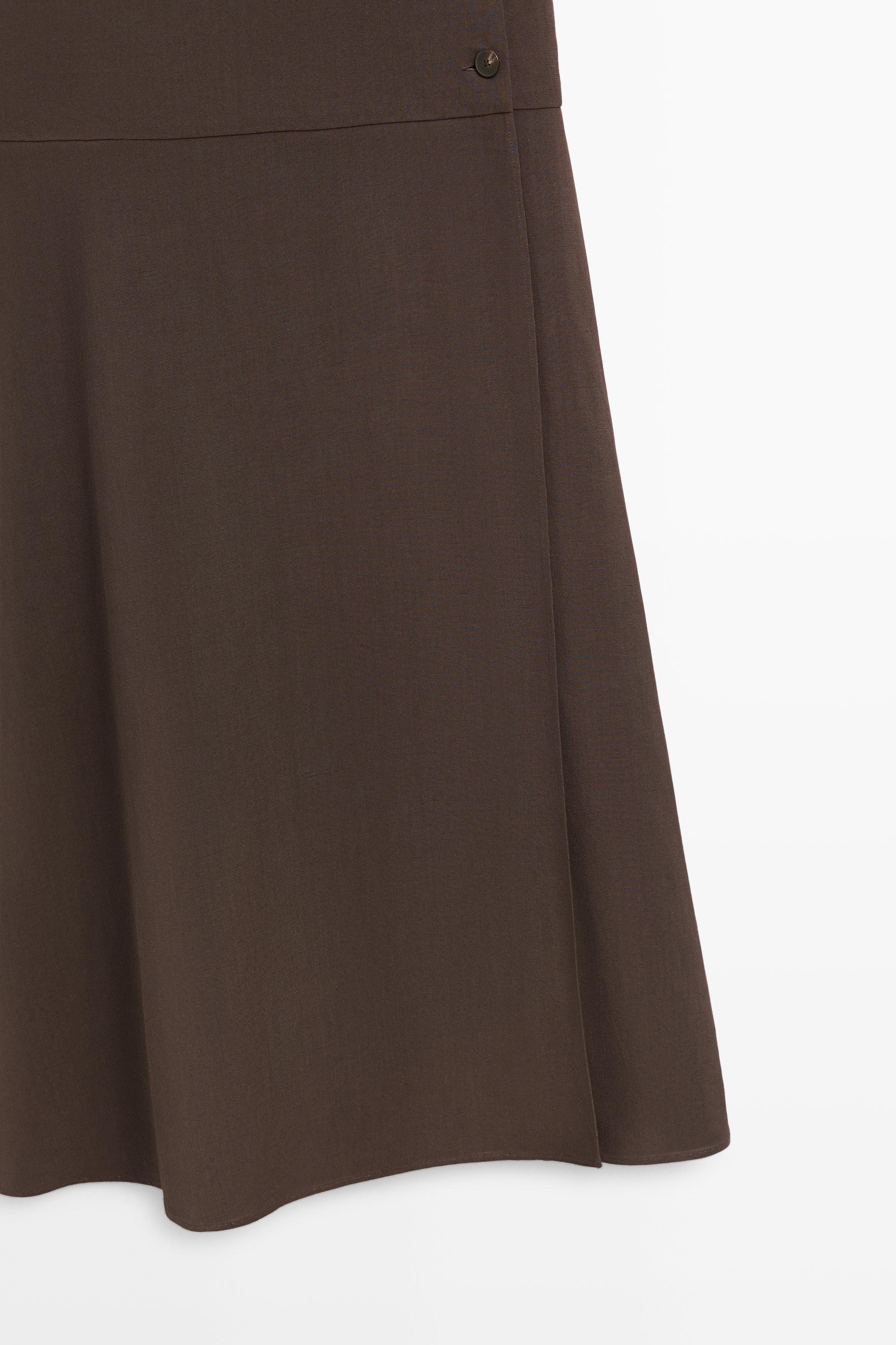 Robe midi à boutons latéraux