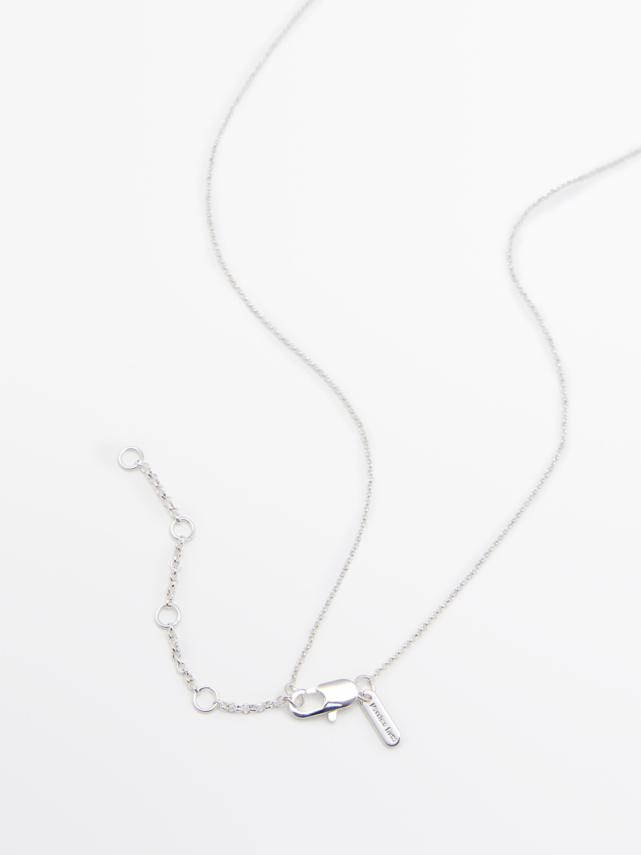 Necklace with glass droplet piece