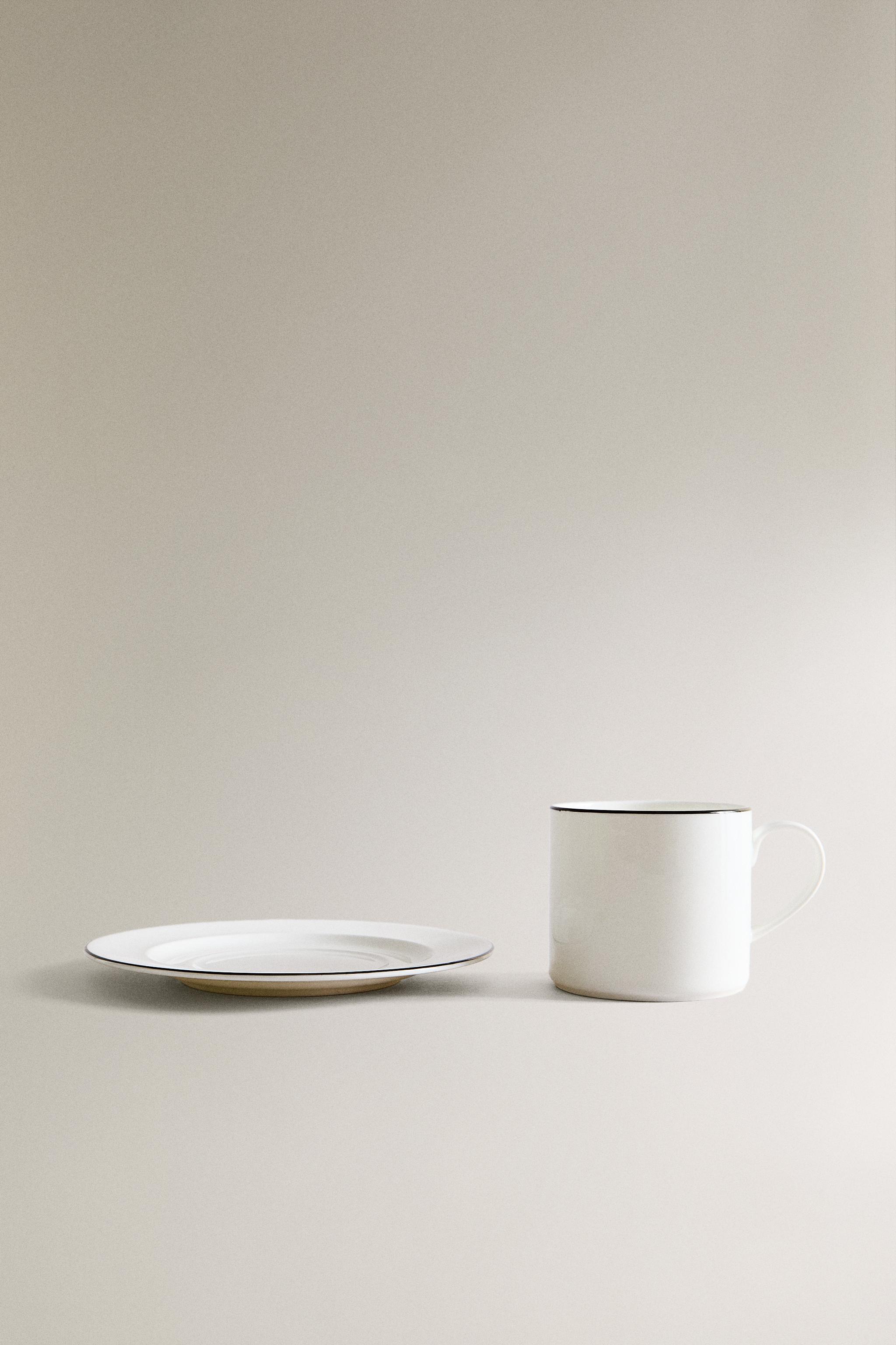 BONE CHINA TEACUP AND SAUCER WITH BLACK RIM