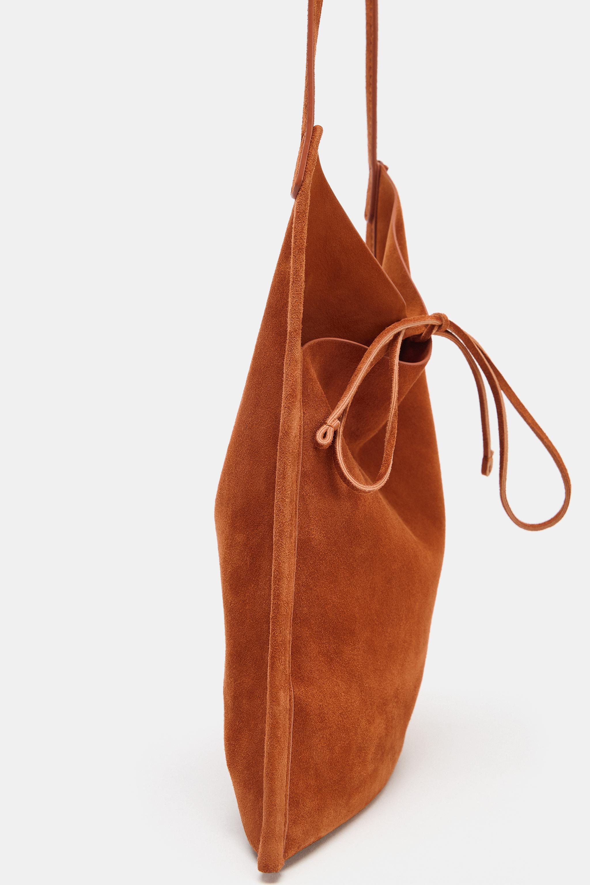 MINI SAC PLAT EN CUIR À NŒUD