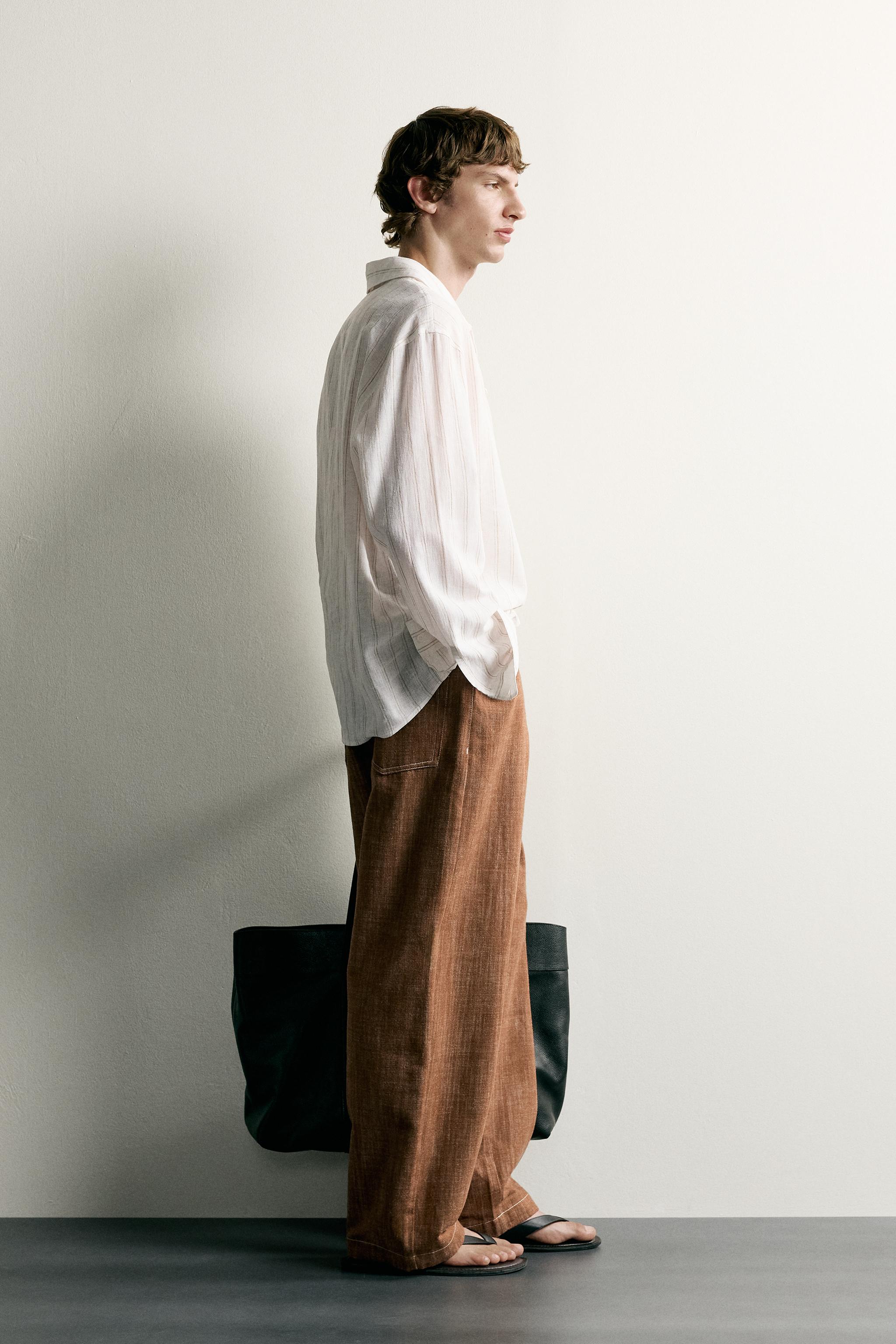 STRIPED COTTON-LINEN POLO SHIRT