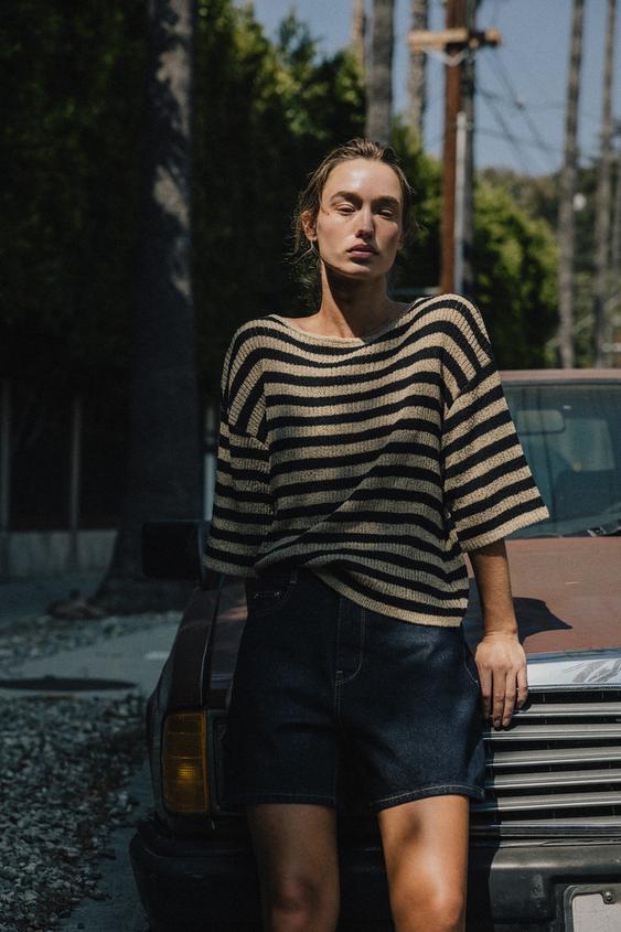 CAPE CUT KNIT SWEATER