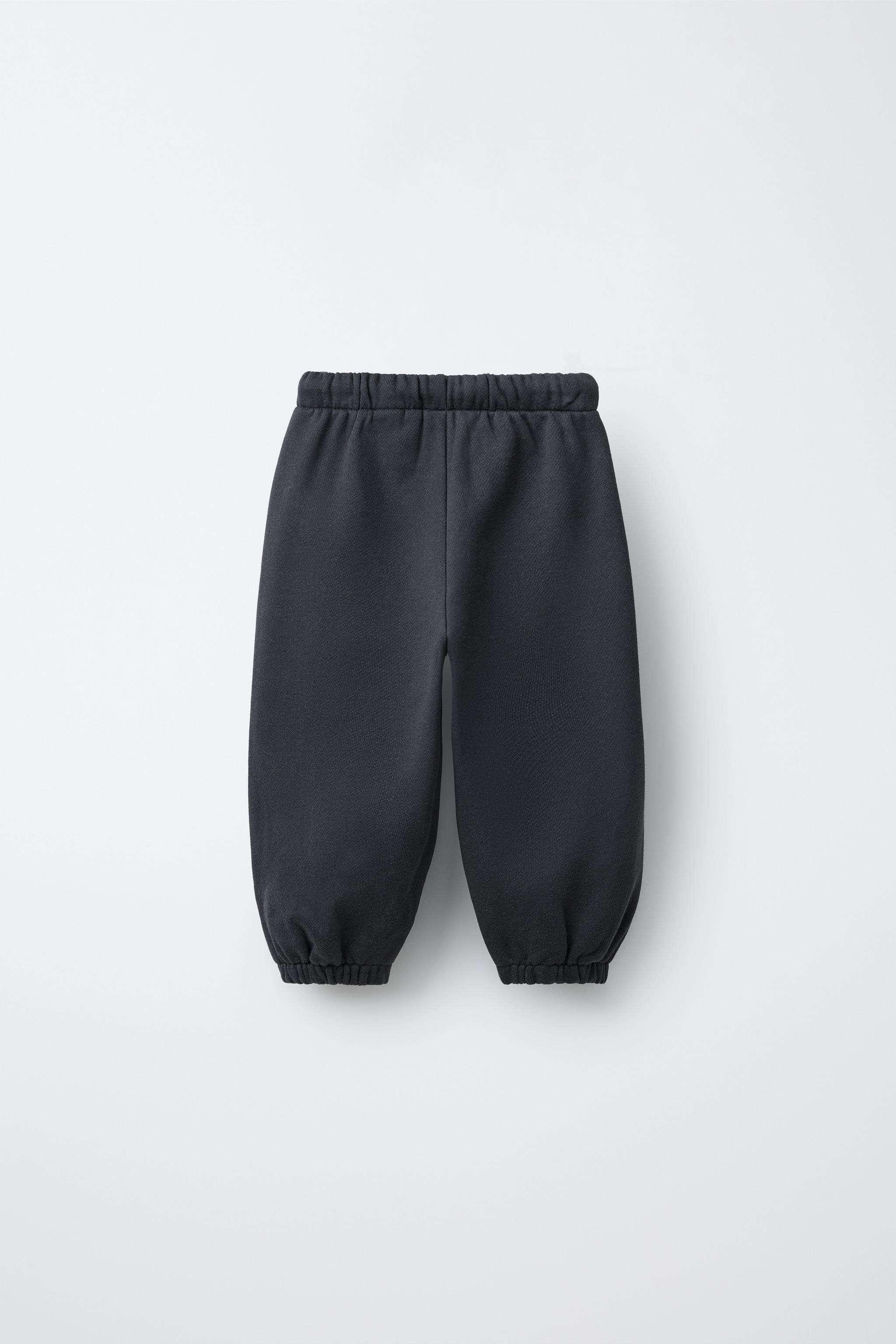 FLOCKED TEXT JOGGER PANTS