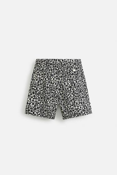 Combinaison maillot de bain 100 manches et jambes longues garçon BANA Combinaison maillot de bain 100 manches et jambes longues garçon BANA