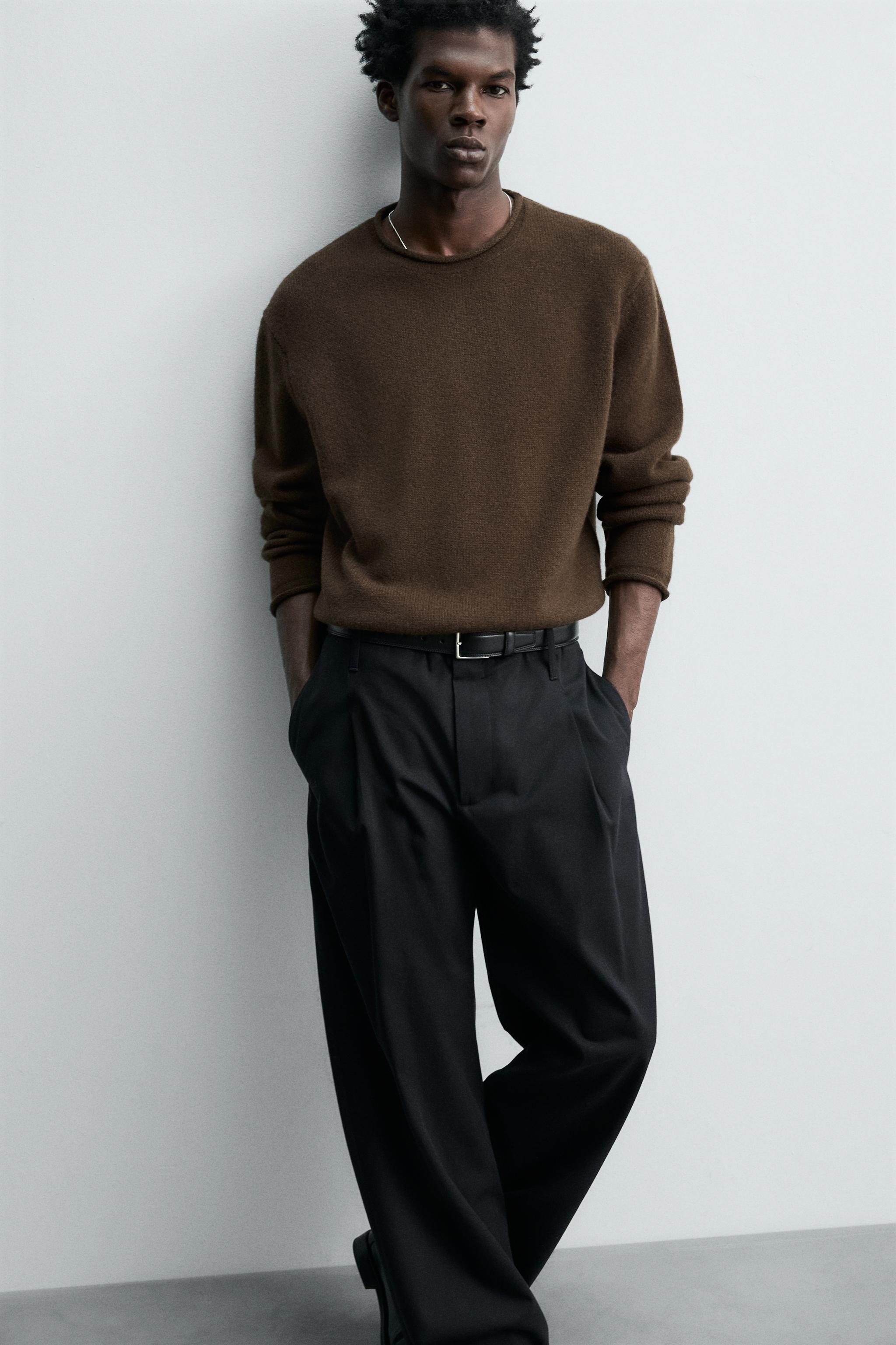 100% WOOL ROLLED-EDGE SWEATER