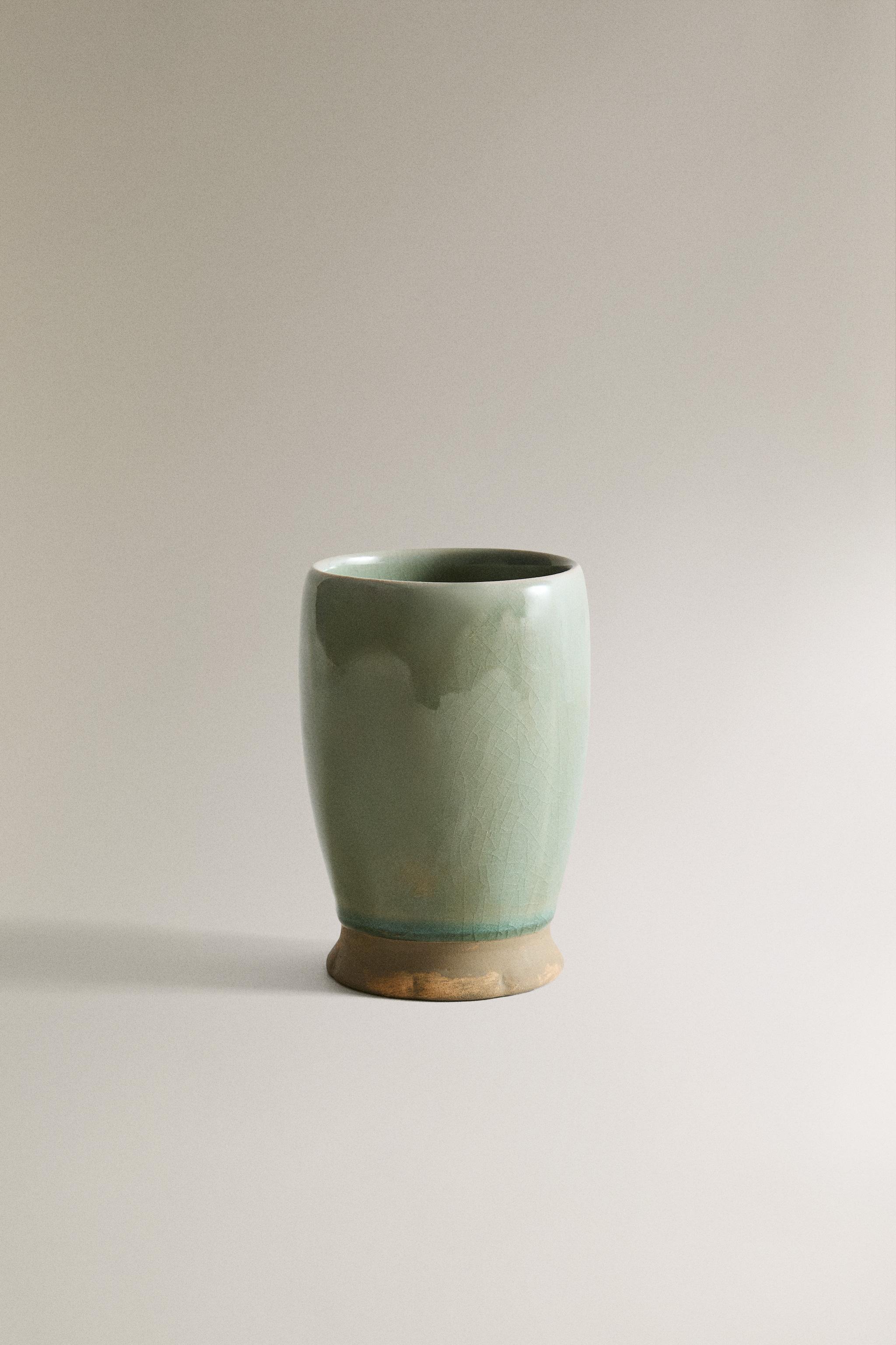 GREENISH TOOTHBRUSH HOLDER