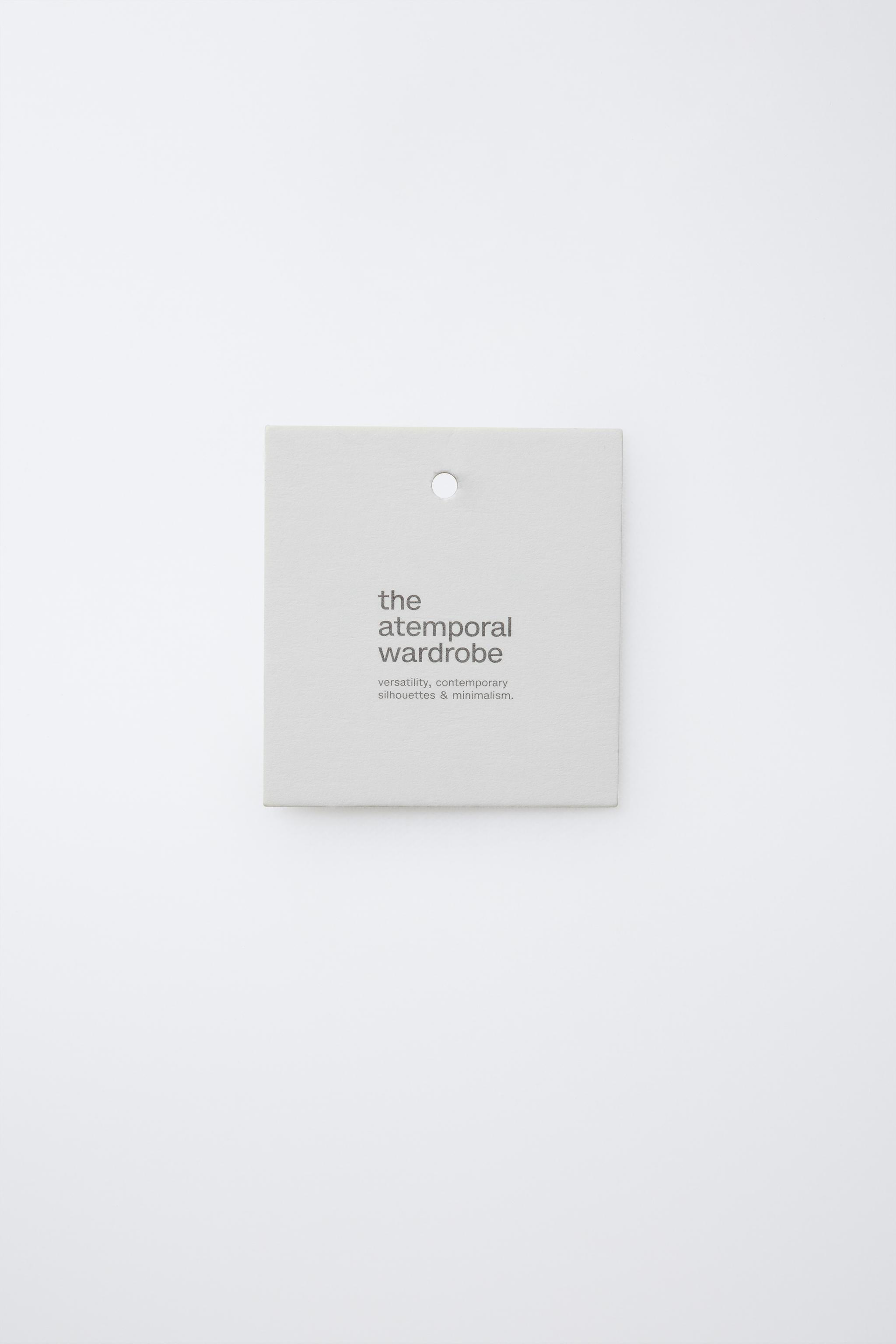 PLAIN T-SHIRT WITH EMBROIDERED TEXT