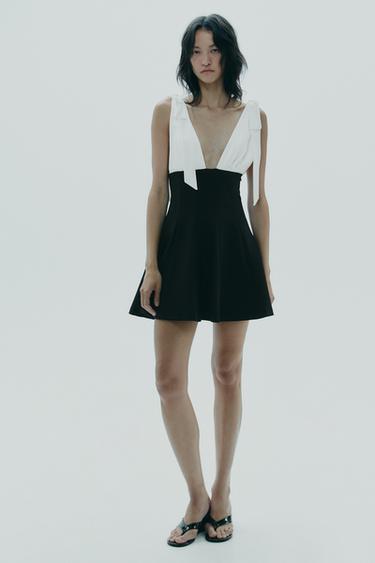 فستان قصير ممزوج بربطات - أسود الخاص بـ Zara
