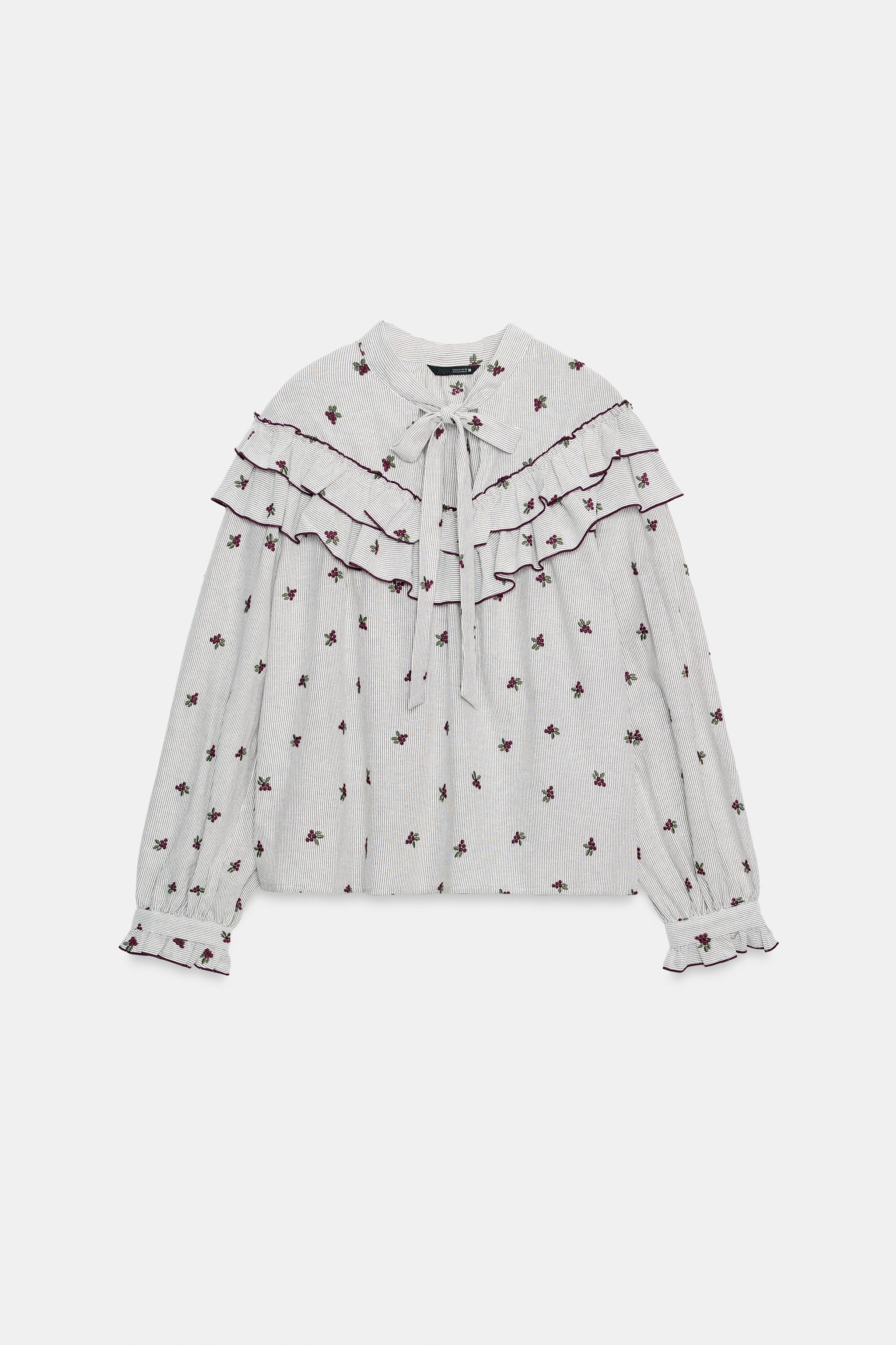BLOUSE À VOLANTS ET BRODERIES