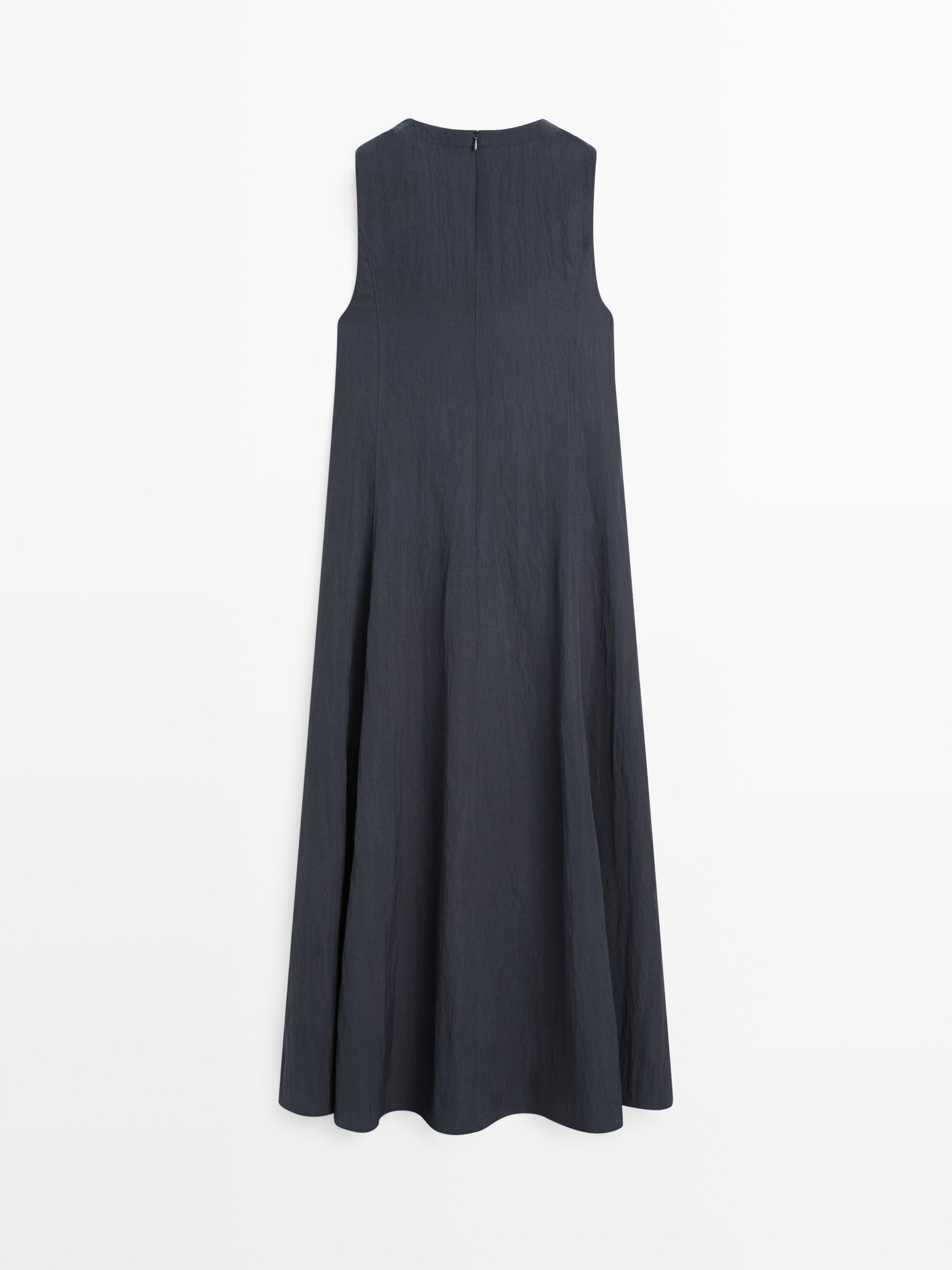 Flowing midi dress with buckles