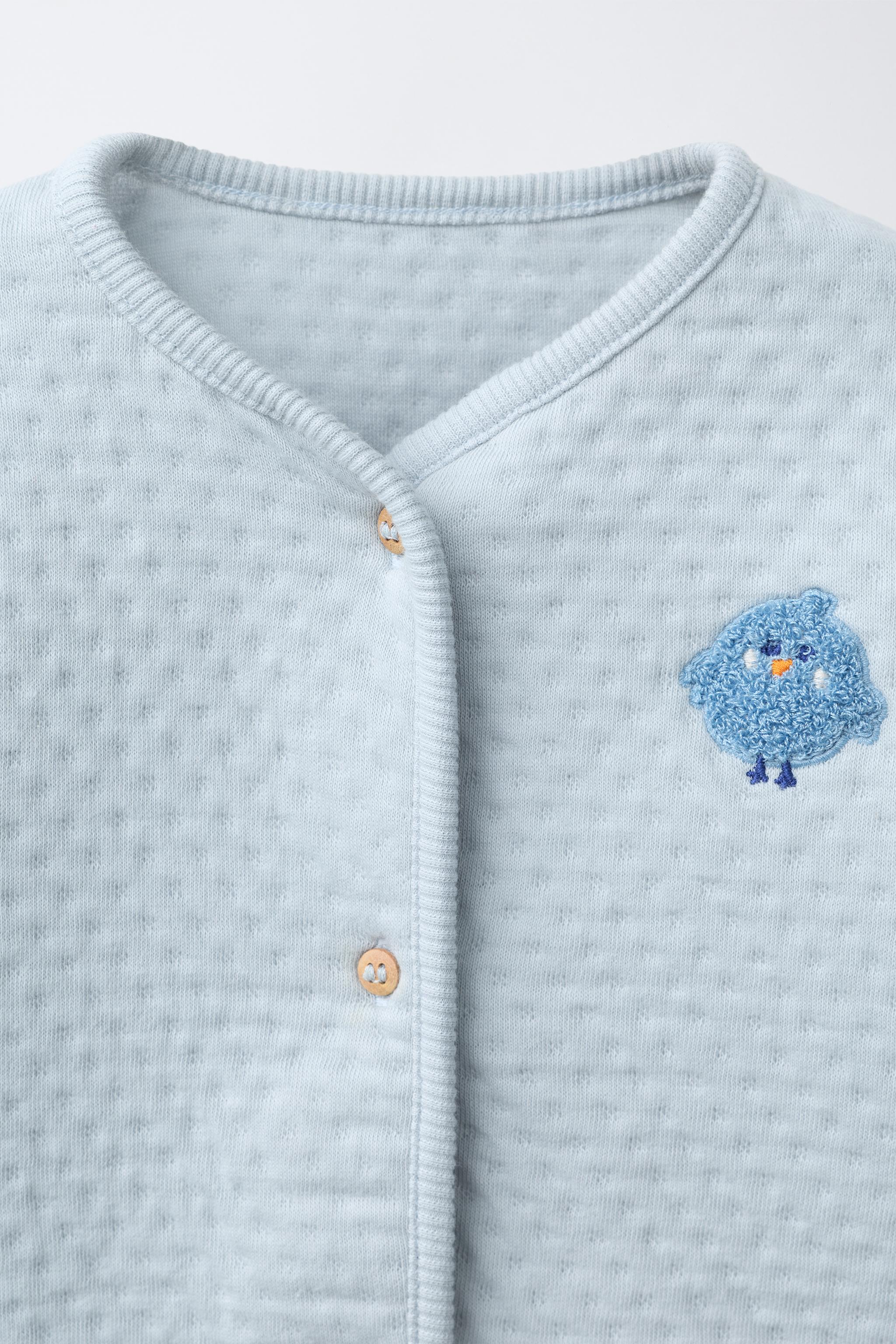 VESTE MATELASSÉE BRODERIE EN VELOURS BOUCLÉ