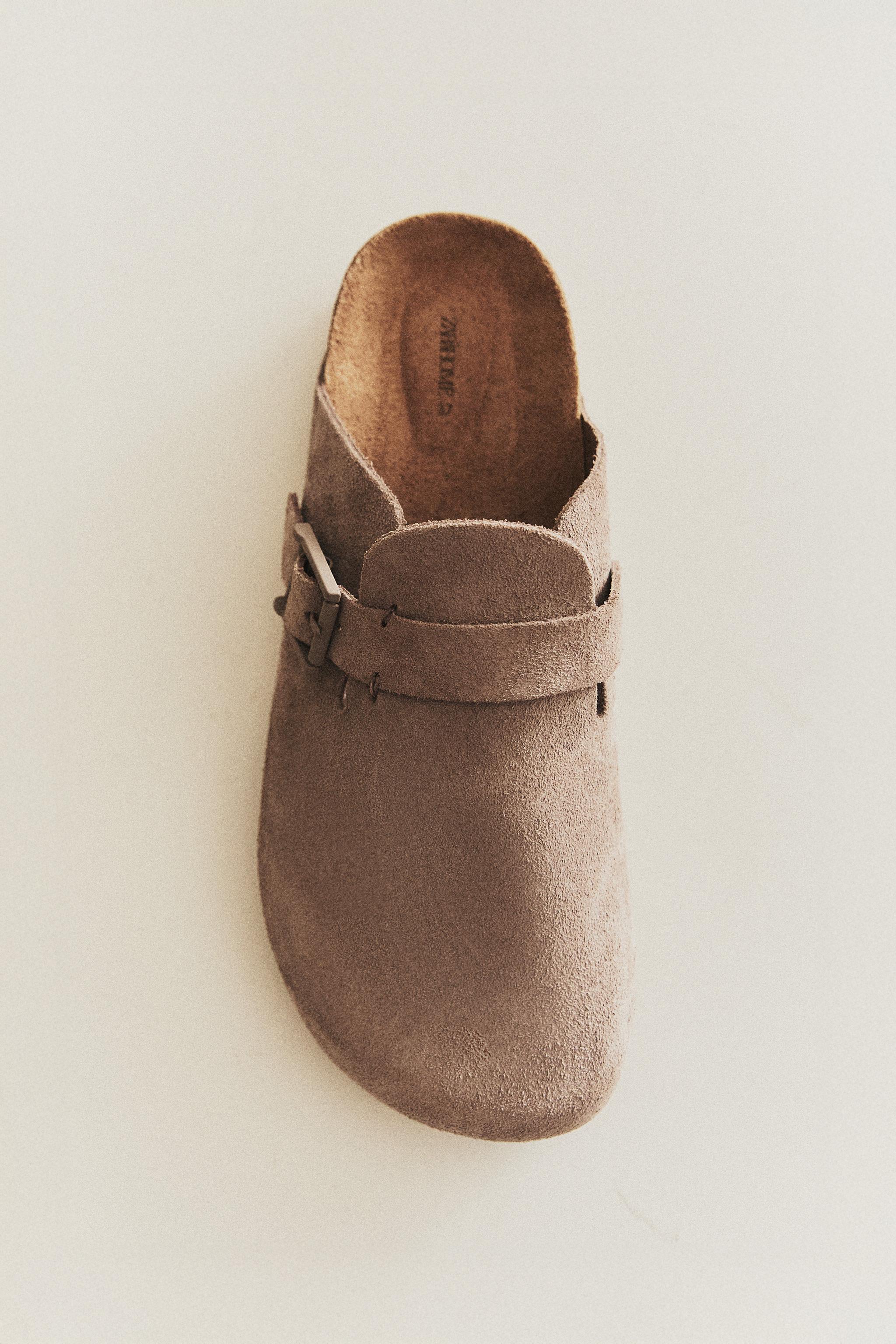 SABOT EN CUIR À BOUCLE ET SURPIQÛRES