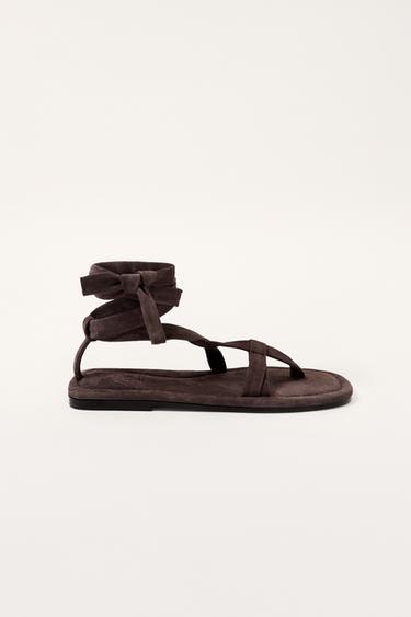 SANDÀLIES PLANES AMB TIRES DE PELL LIMITED EDITION - Marró de Zara