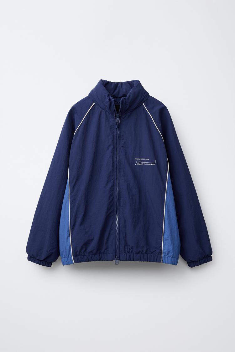 WATER-REPELLENT RAINCOAT WITH SLOGAN PRINT AND HOOD Blue ZARA