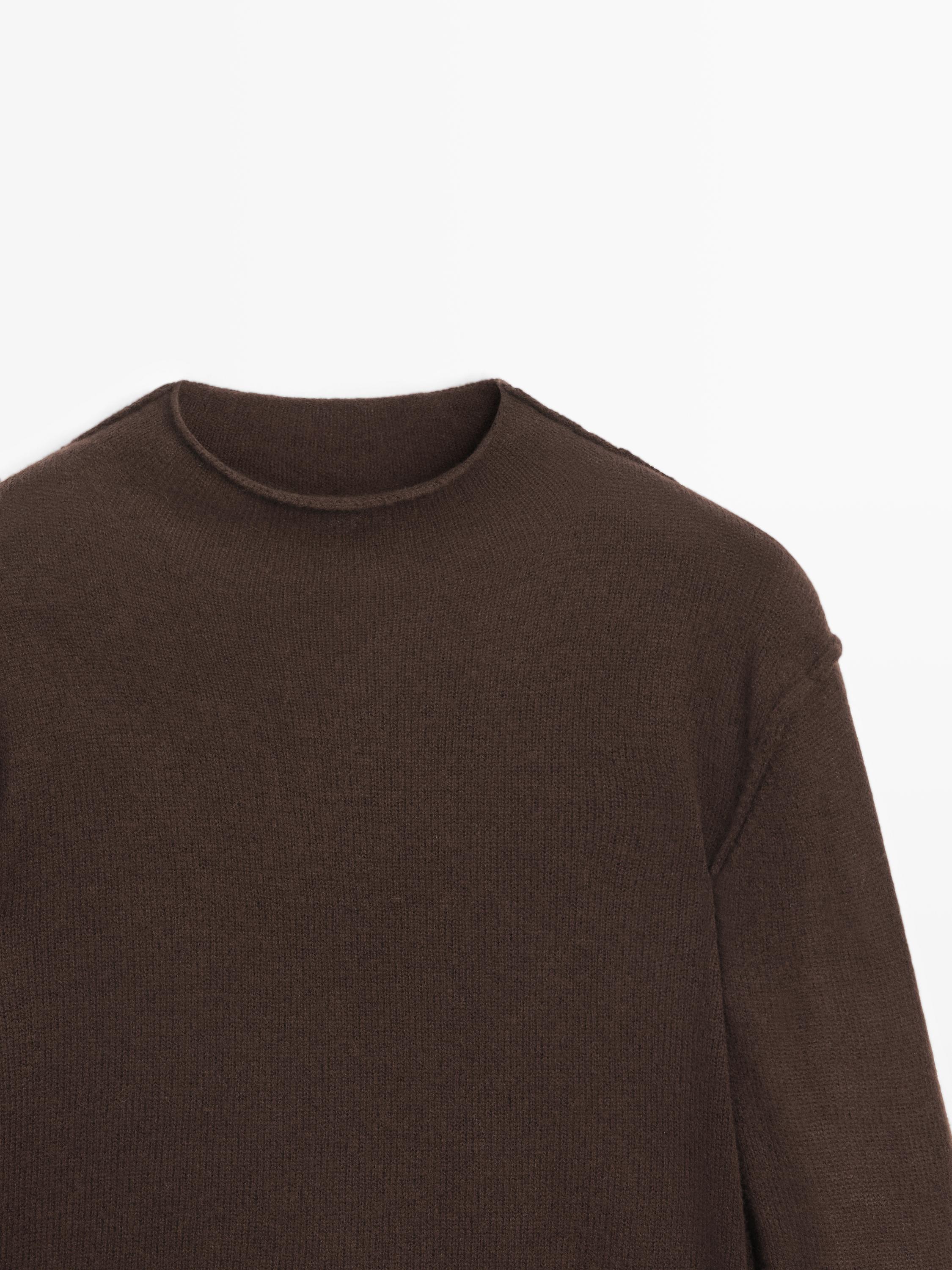 Pull à col montant en maille de laine mélangée