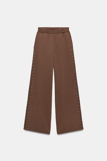 PANTALON EN MOLLETON EFFET DÉLAVÉ CLOUS - Marron foncé de Zara - Image 0