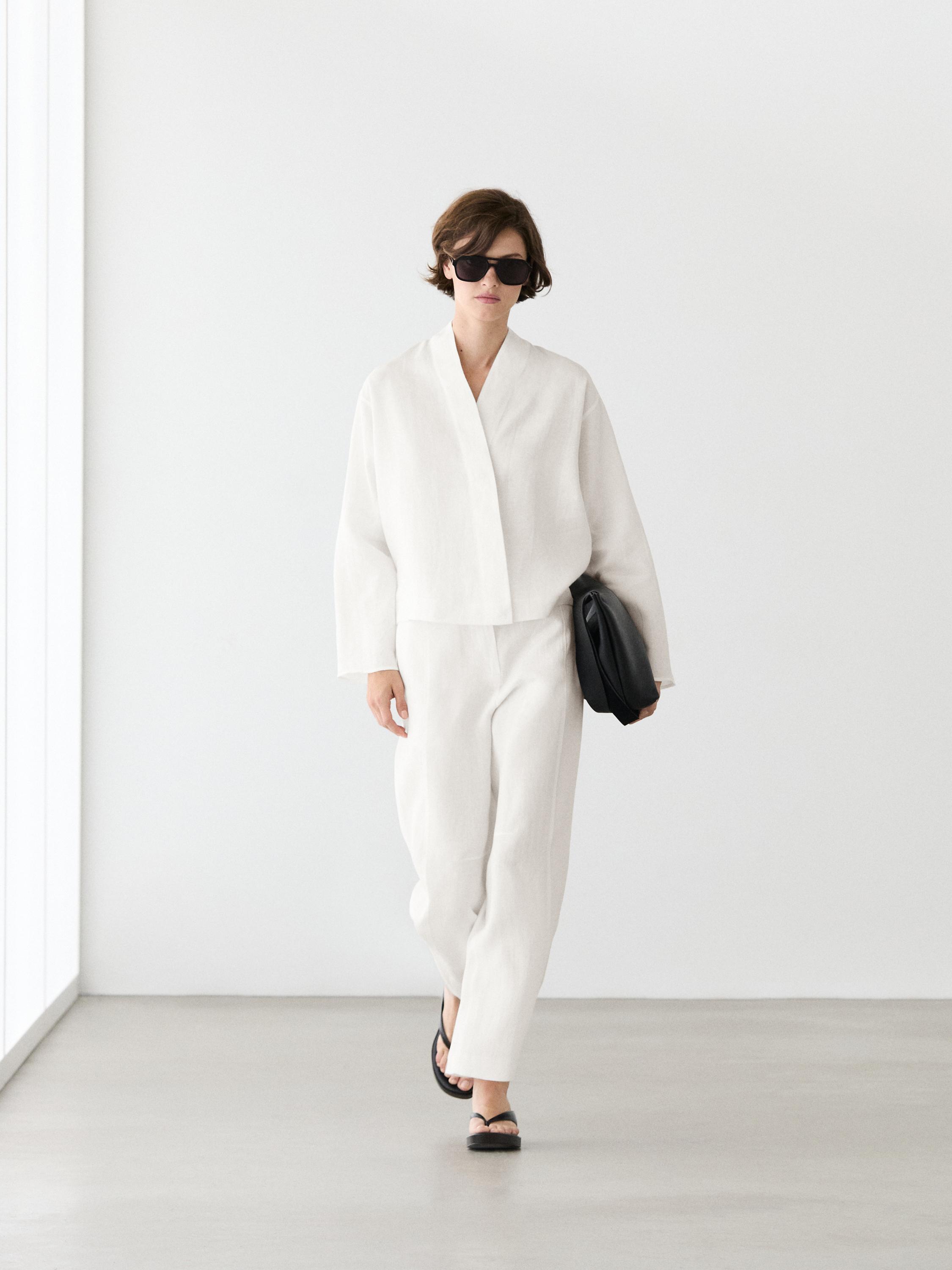 Flowing linen blouse with surplice neckline