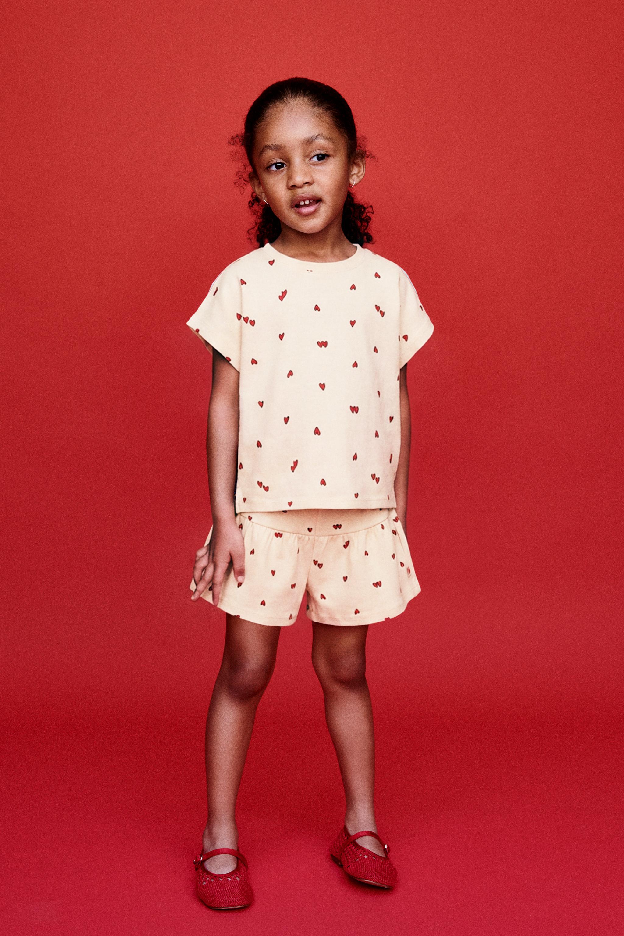 PRINTED PLUSH BERMUDA SHORTS — Red