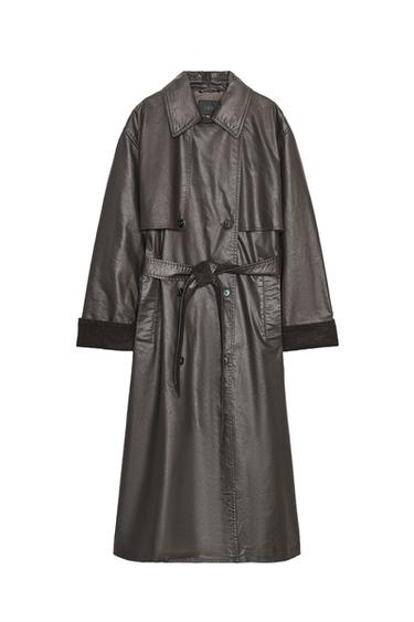 Front view of a long dark brown trench coat with a notched lapel collar, tie belt, long sleeves with corduroy cuffs, and side pockets.