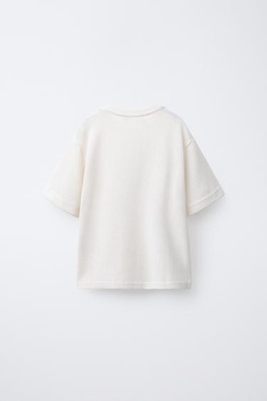 T-SHIRT EN MAILLE À TEXTURE - Écru de Zara - Image 1