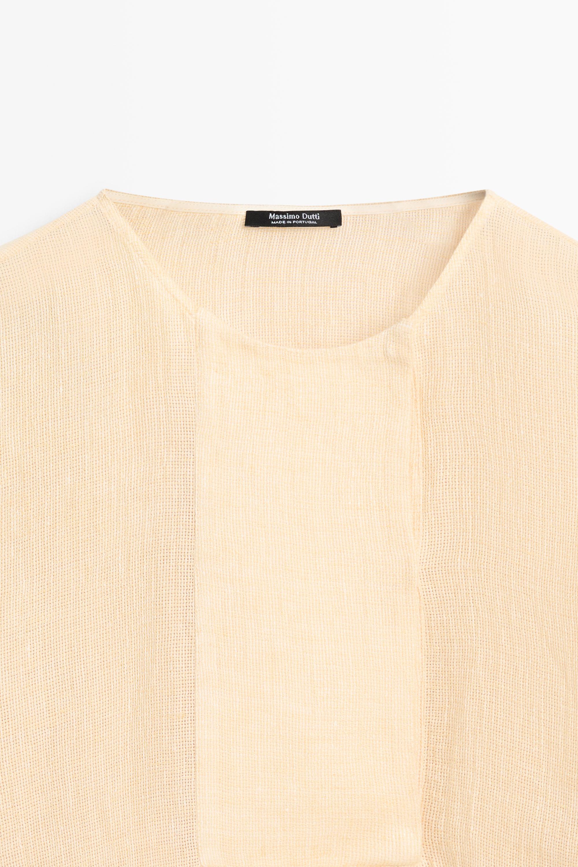 Flowing linen blouse with chest detail