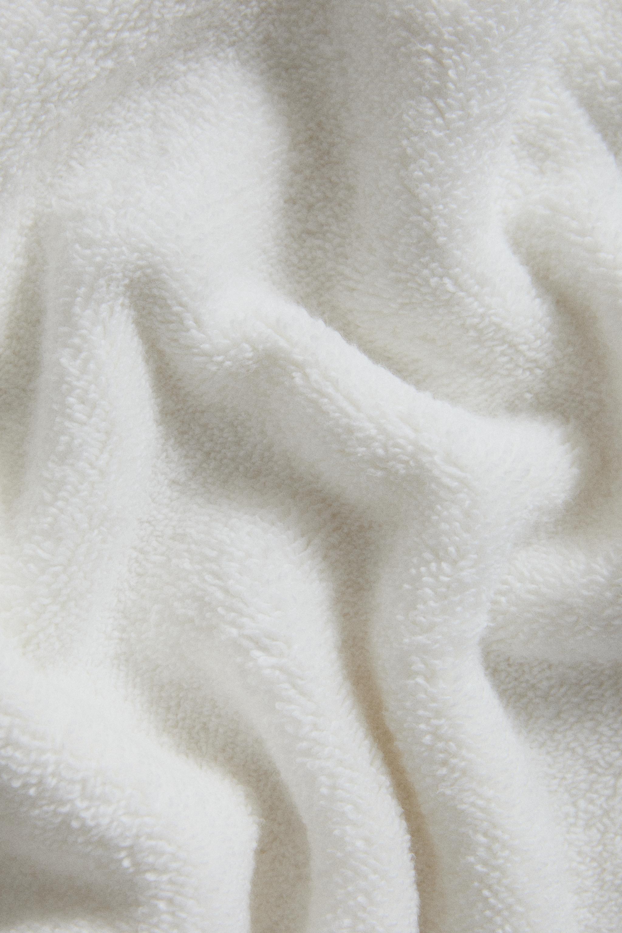 SERVIETTE DE BAIN FESTONNÉE