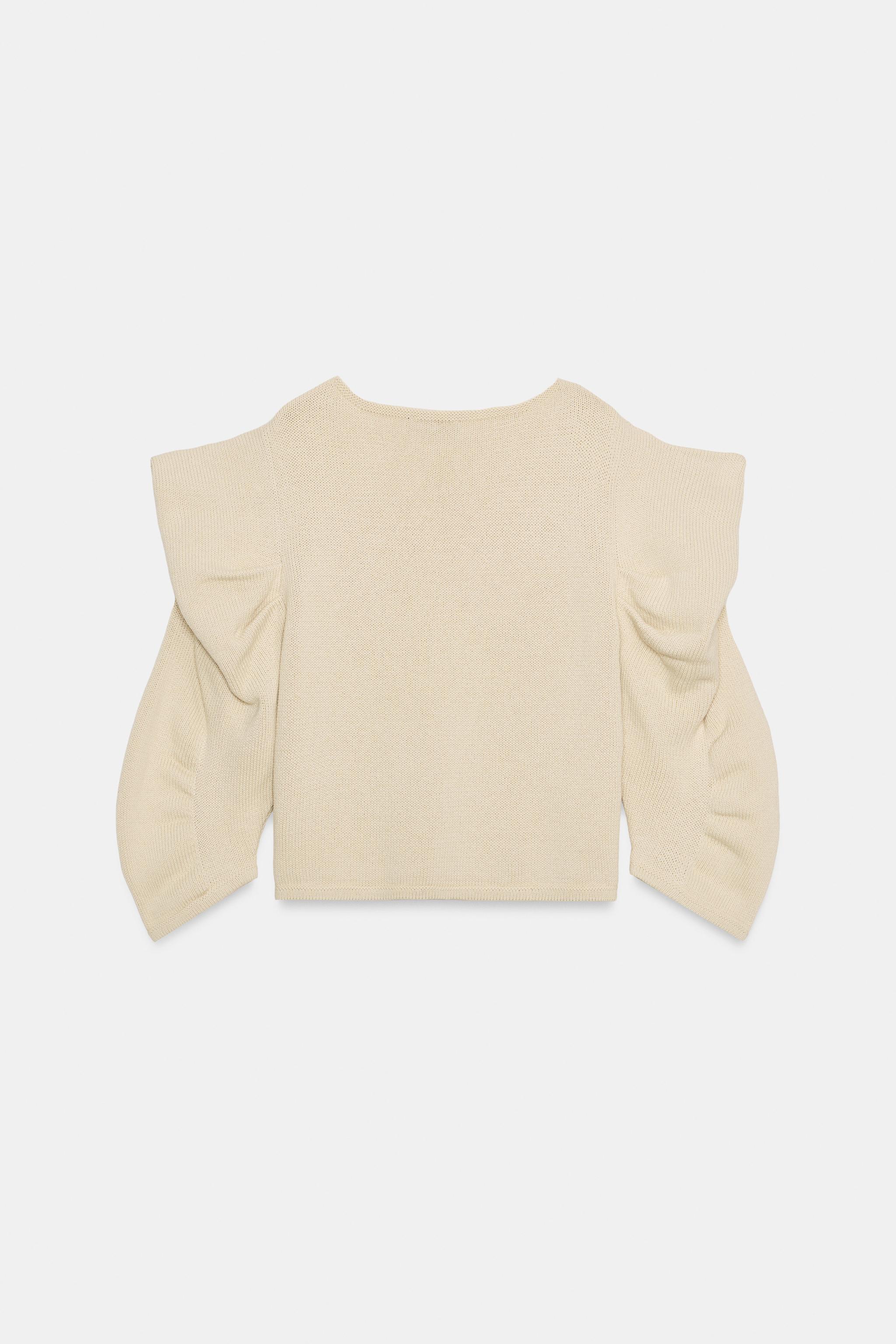 PULL EN MAILLE À MANCHES DRAPÉES