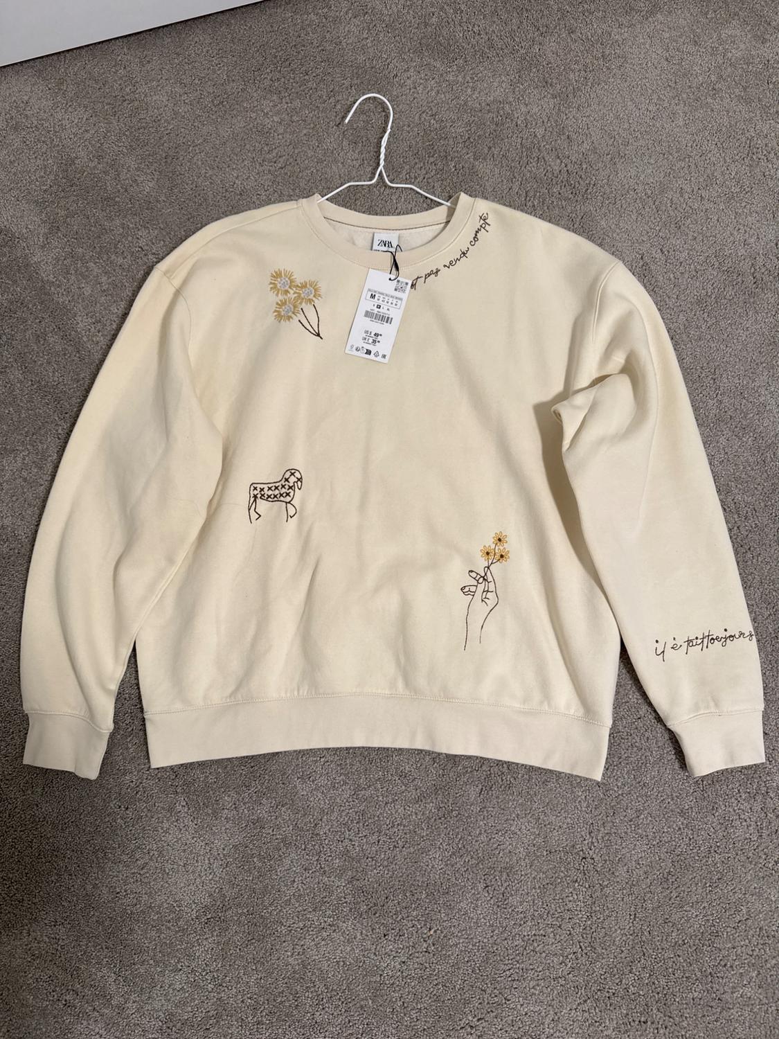 SUDADERA BORDADOS COMBINADOS