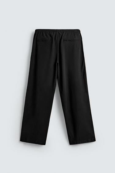 RELAXED FIT FLOWING TROUSERS - Black by Zara - Image 7