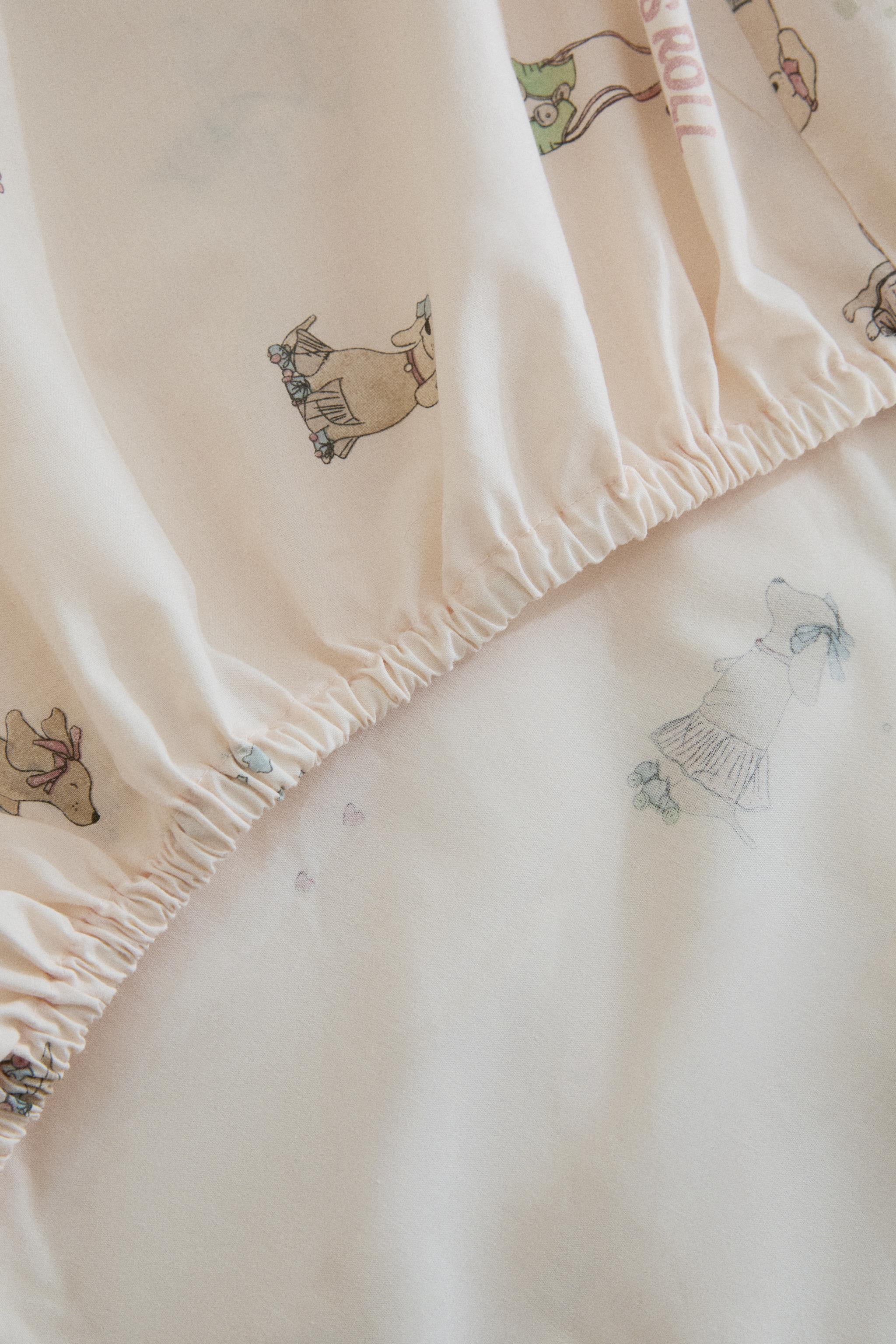 DRAP-HOUSSE ENFANT CHIEN SKATEUR