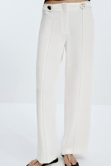 PANTALON PASSANTS SURPIQÛRES CONTRASTE - Blanc cassé de Zara - Image 1