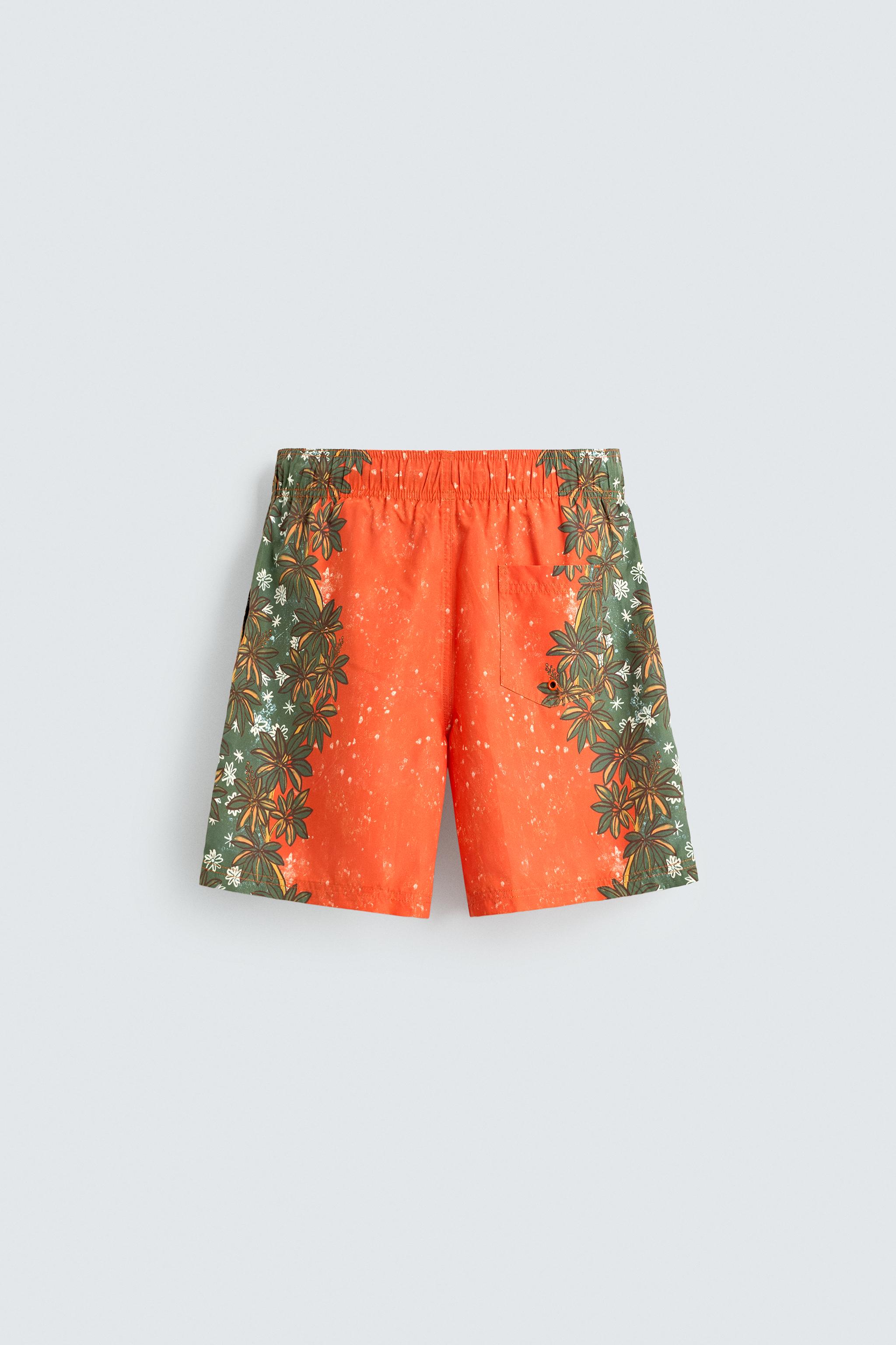 LONG FLORAL PRINT SWIM TRUNKS