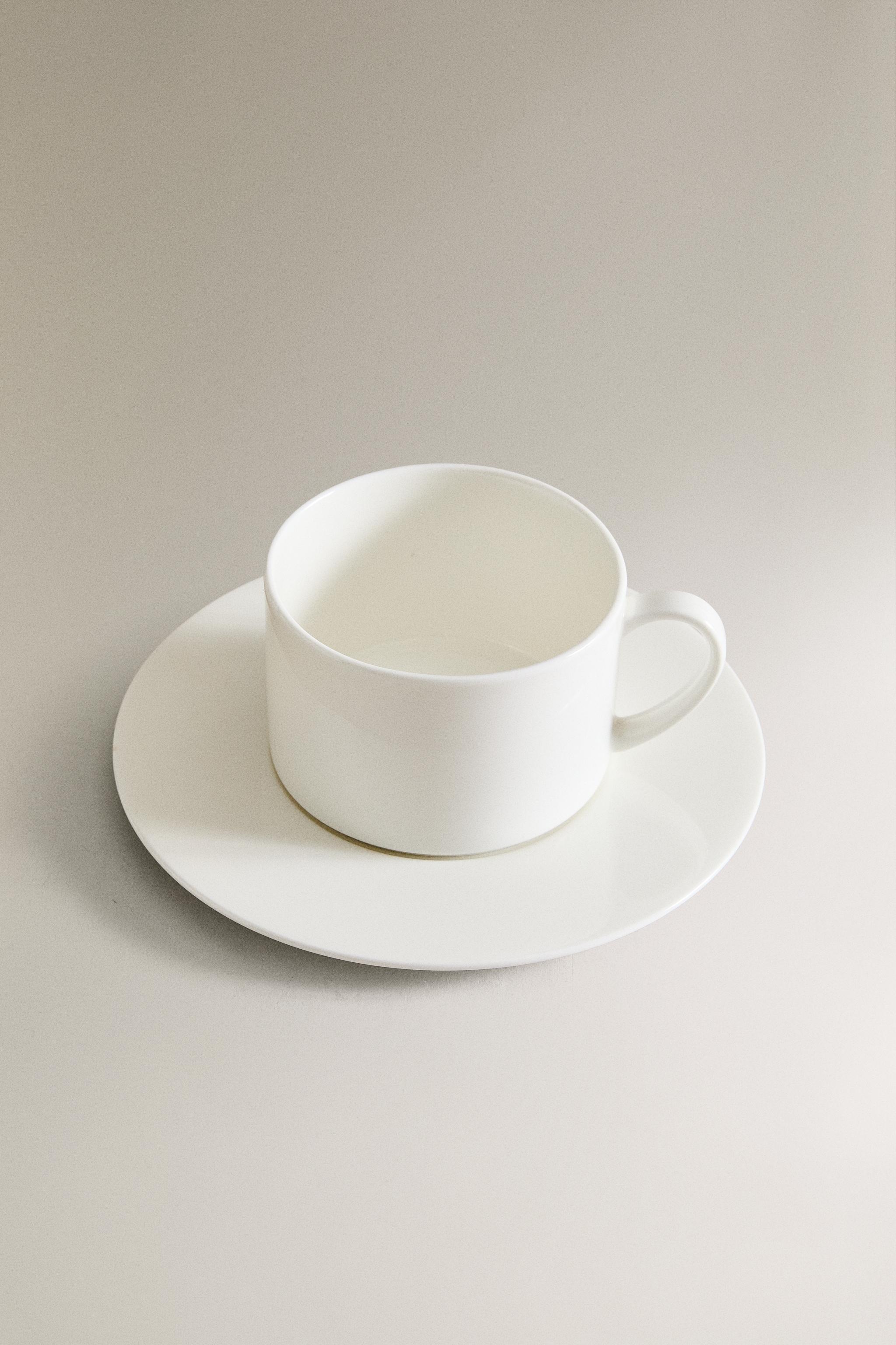 BONE CHINA TEACUP AND SAUCER — White