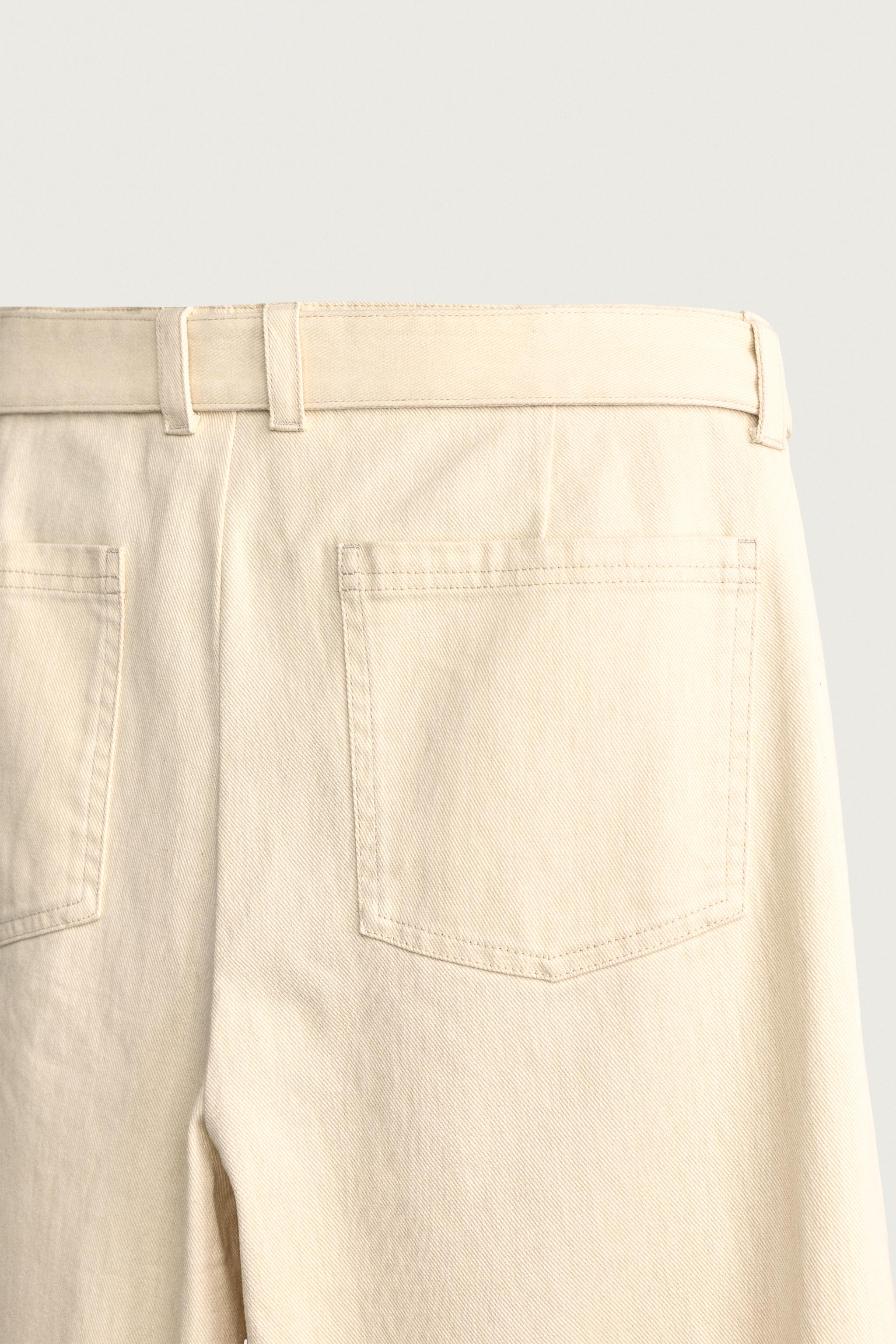 BELTED PLEATED RELAXED FIT PANTS