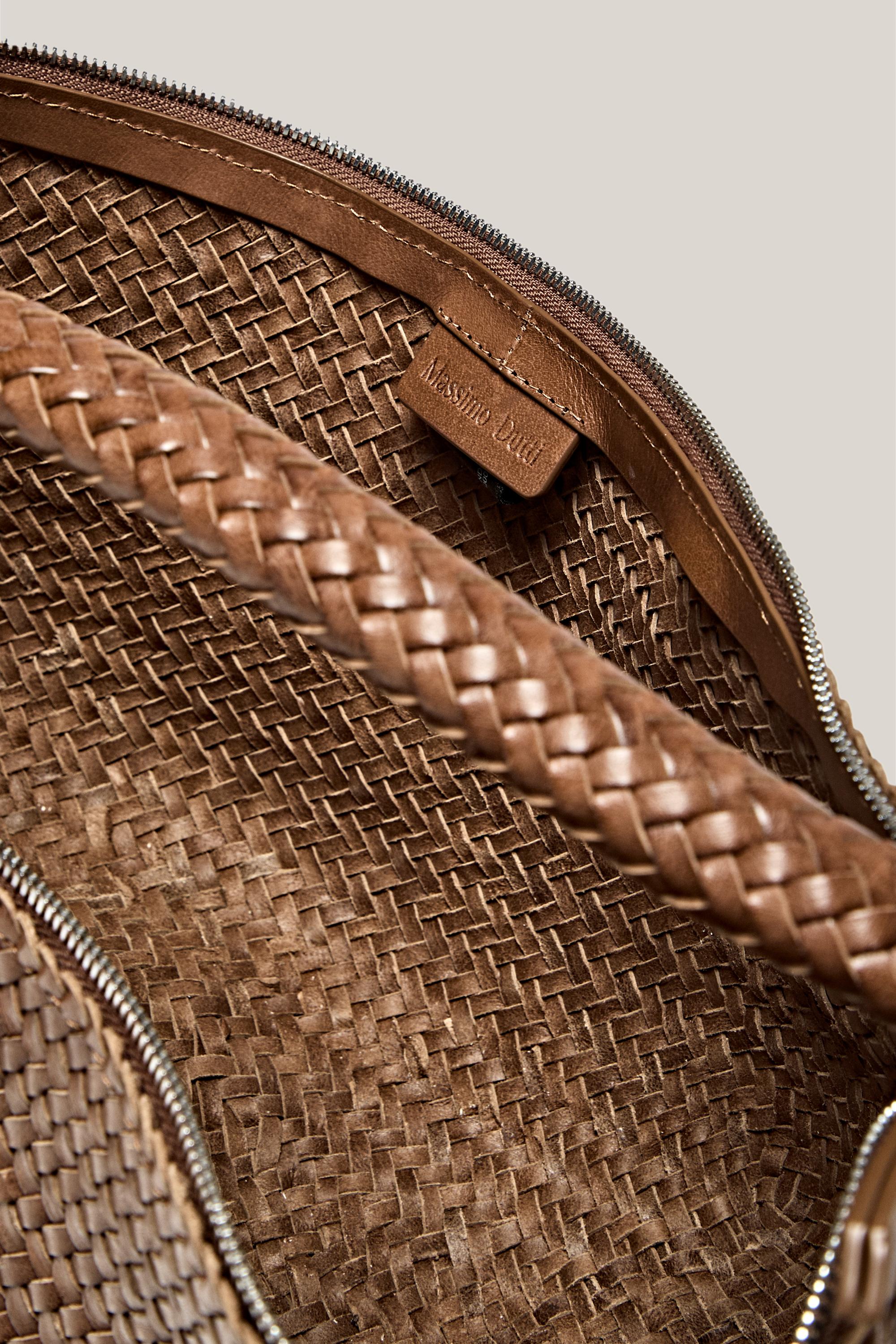 Sac demi-lune tressé cuir