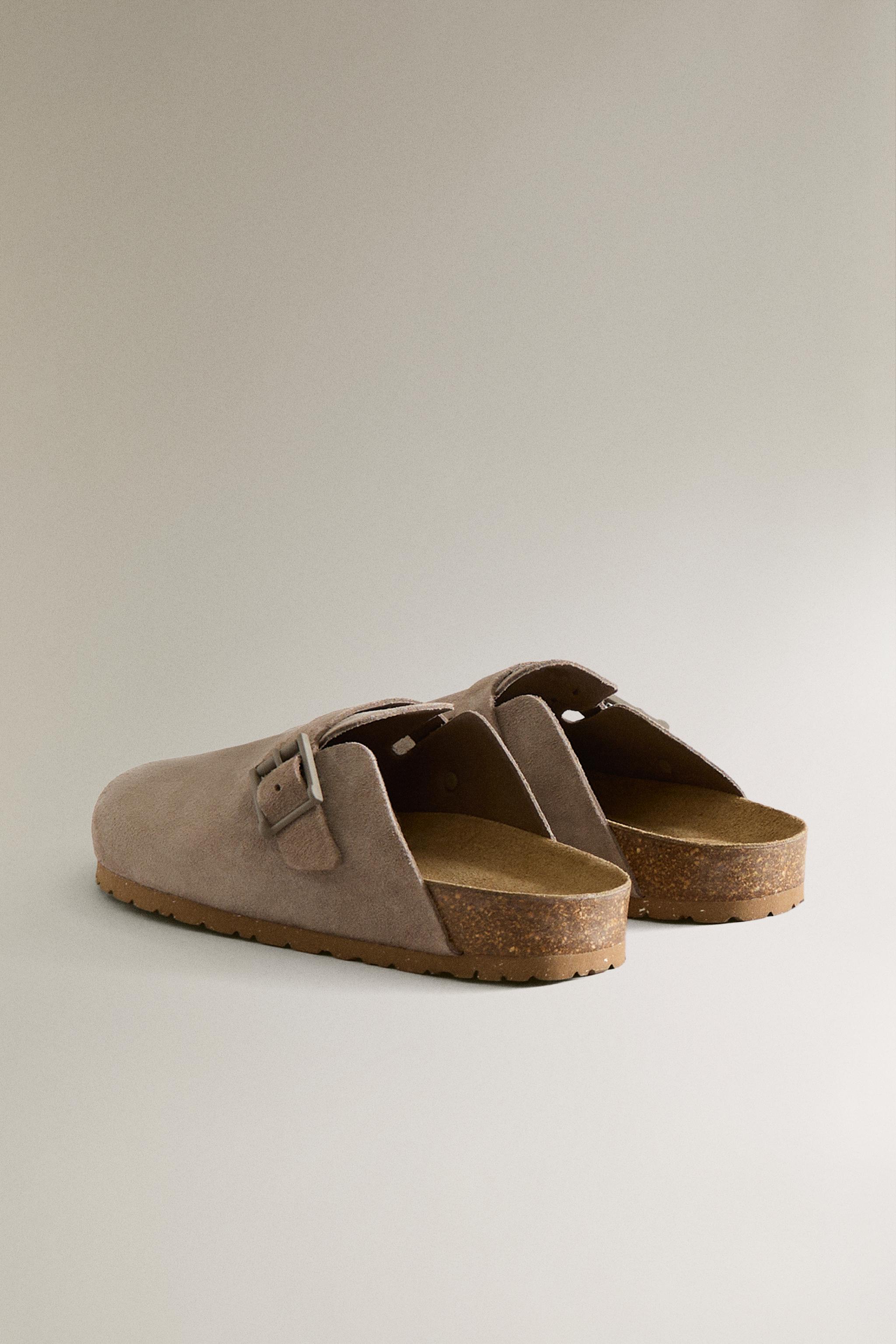 SABOT EN CUIR À BOUCLE ET SURPIQÛRES