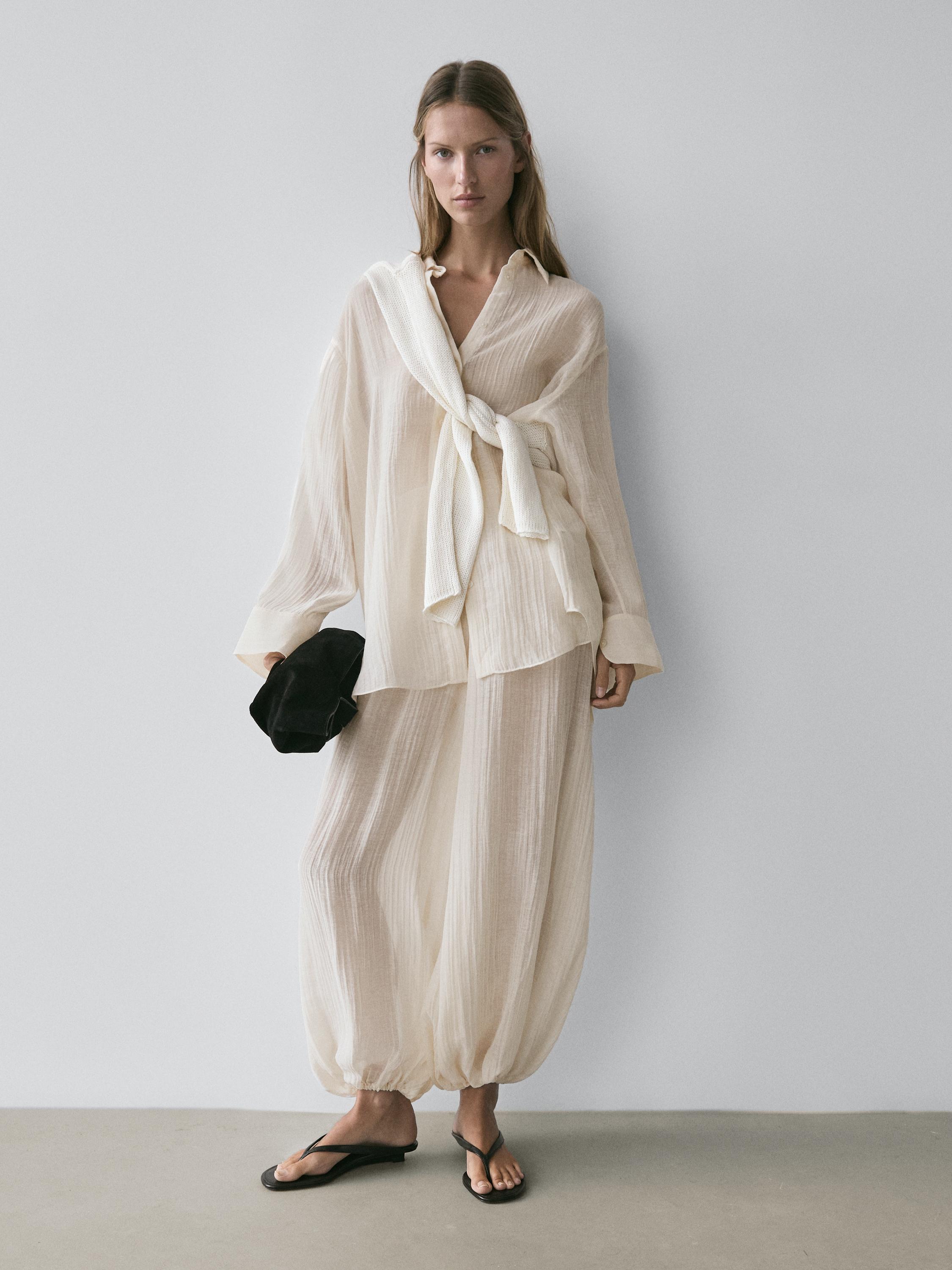 Flowing shirt with pleated detail