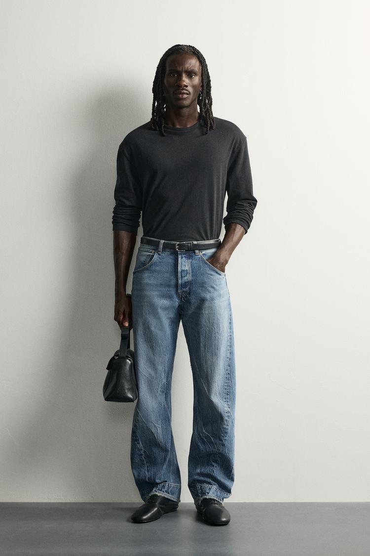 TWISTED SEAM STRAIGHT-LEG JEANS