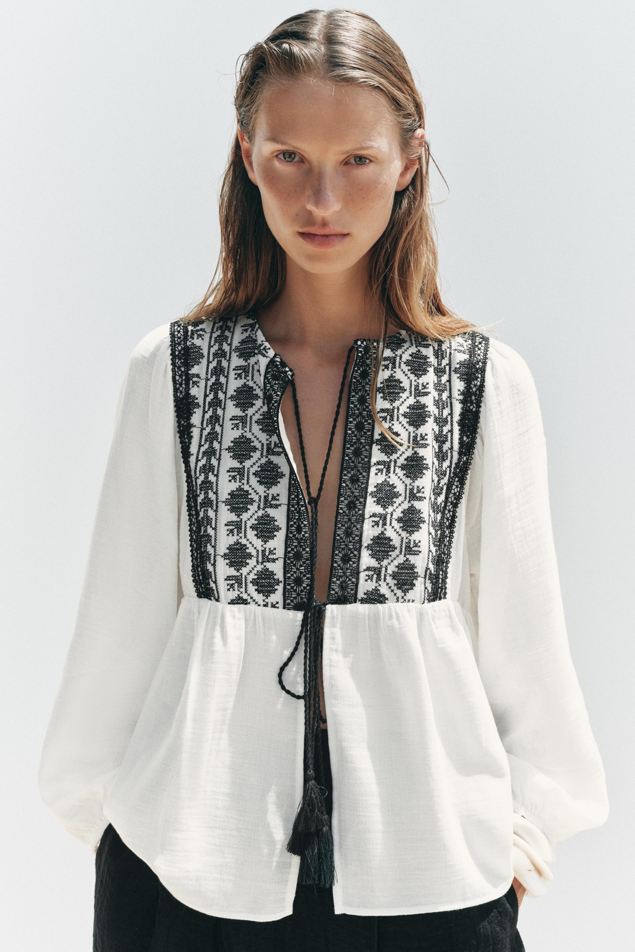 VESTE BRODERIES CONTRASTANTES